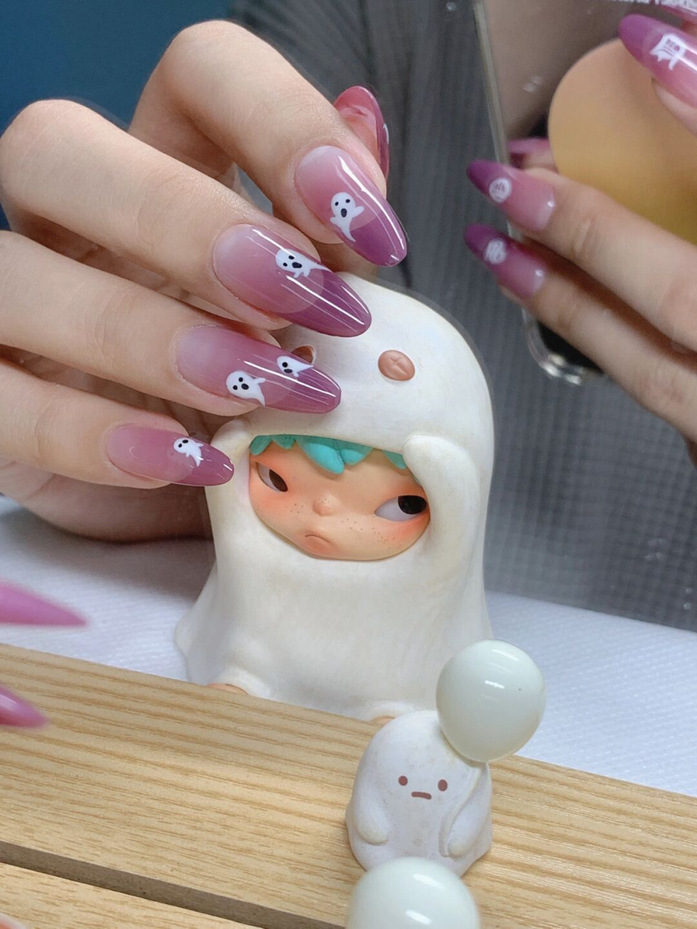 Purple and White Ombre Long Almond Nails shown as a nail art design with purple, white, ombre, cute, animal print, almond and long details.