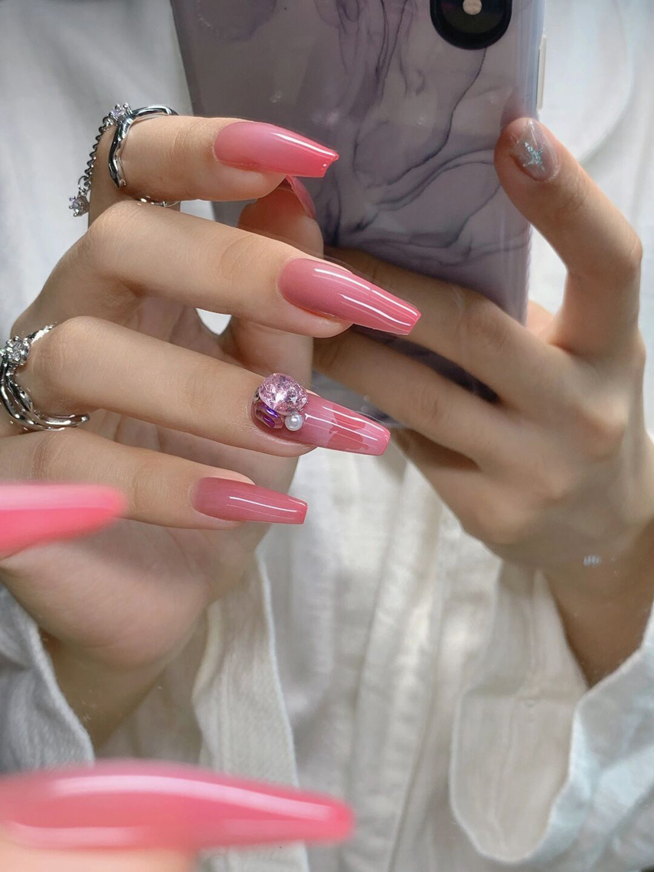 Pink 3D Long Coffin Nails shown as a nail art design with pink, 3d, elegant, coffin and long details.