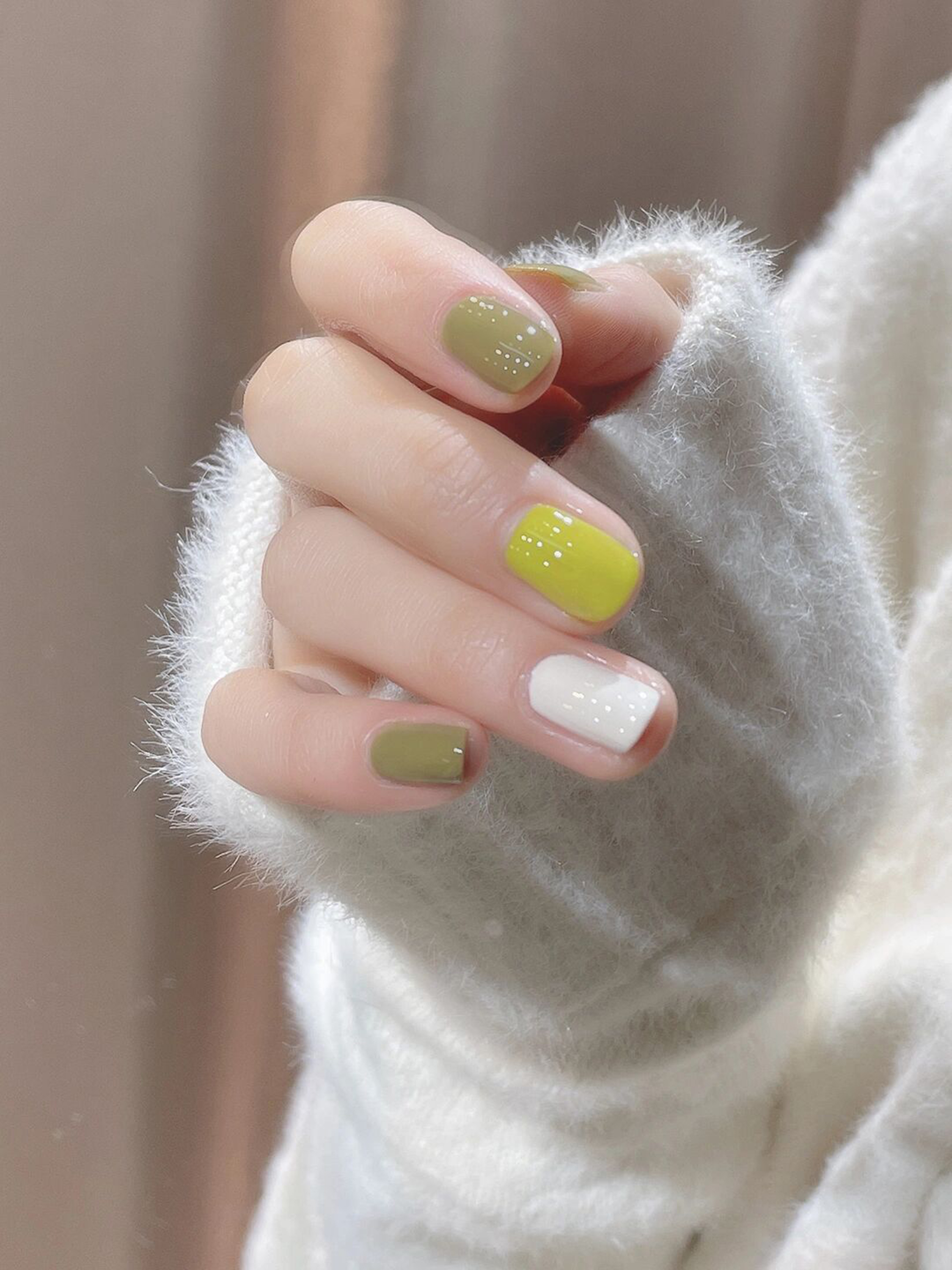 Green, White and Yellow Polka Dot Short Nails shown as a nail art design with green, white, yellow, cute, polka dot and short details.