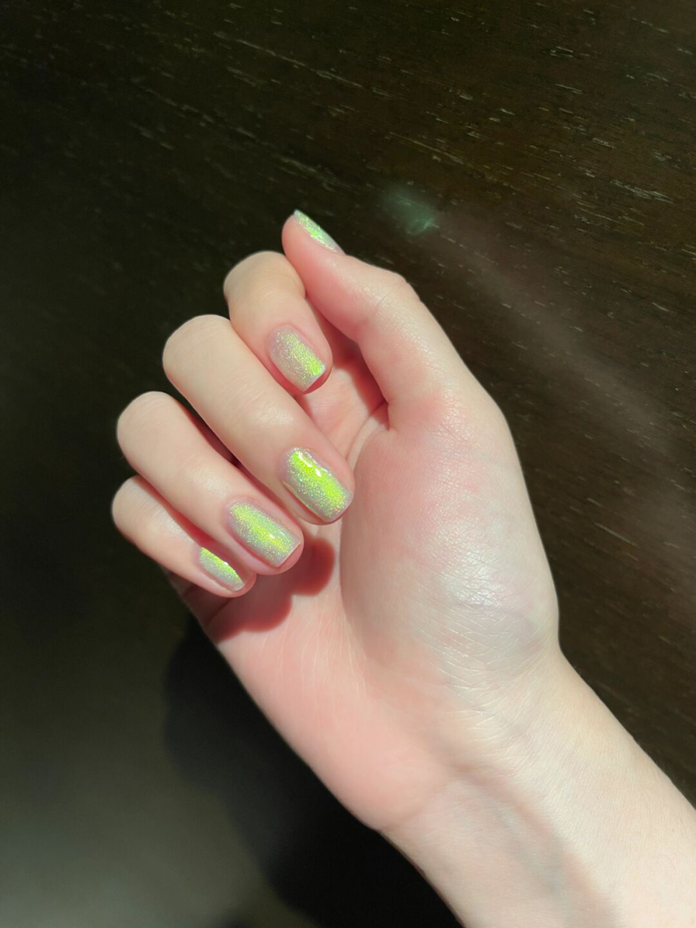 Green Chrome Short Nails shown as a nail art design with green, chrome and short details.
