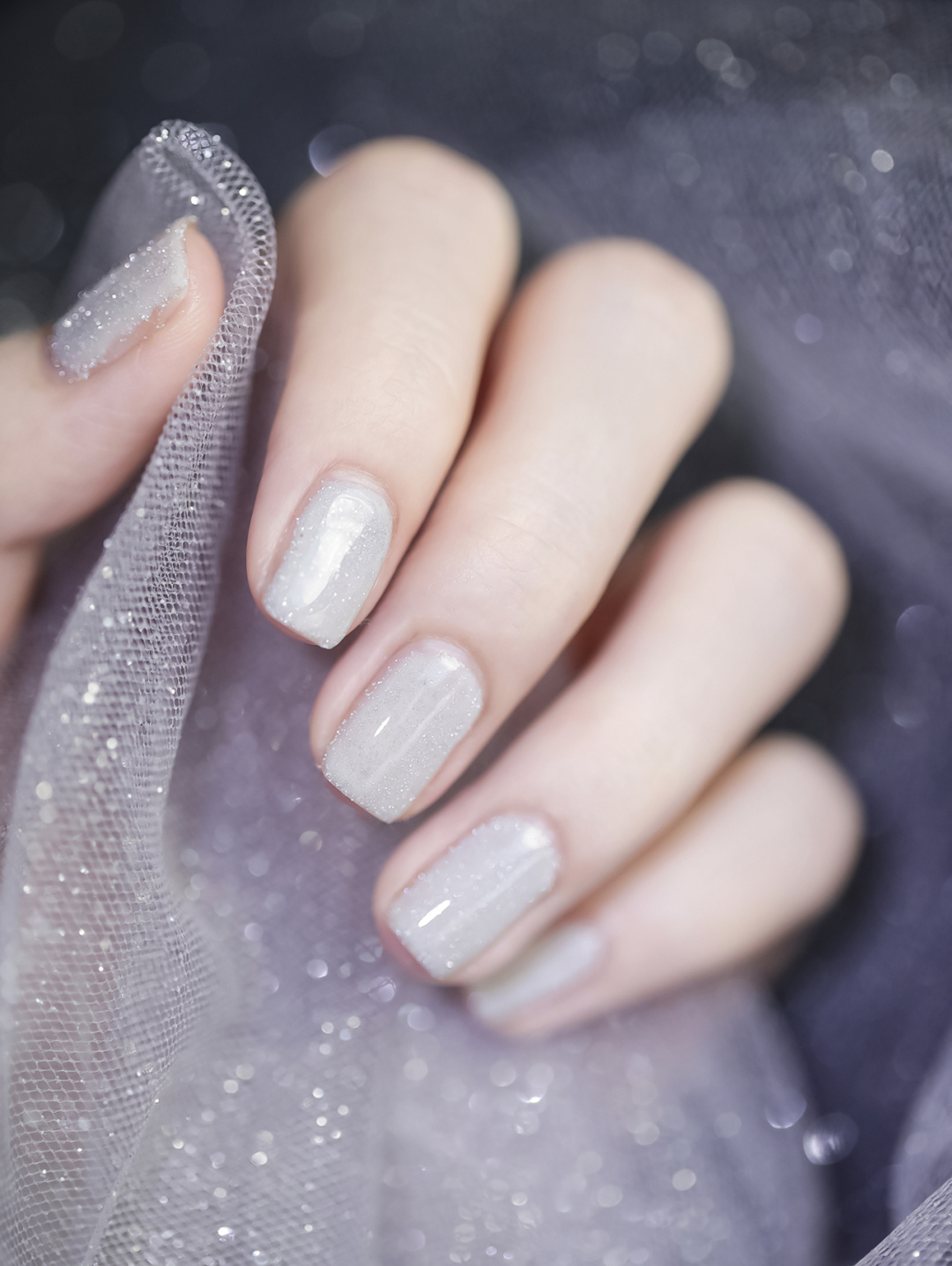 White Glitter Nails shown as a nail art design with white, glitter, elegant and medium details.