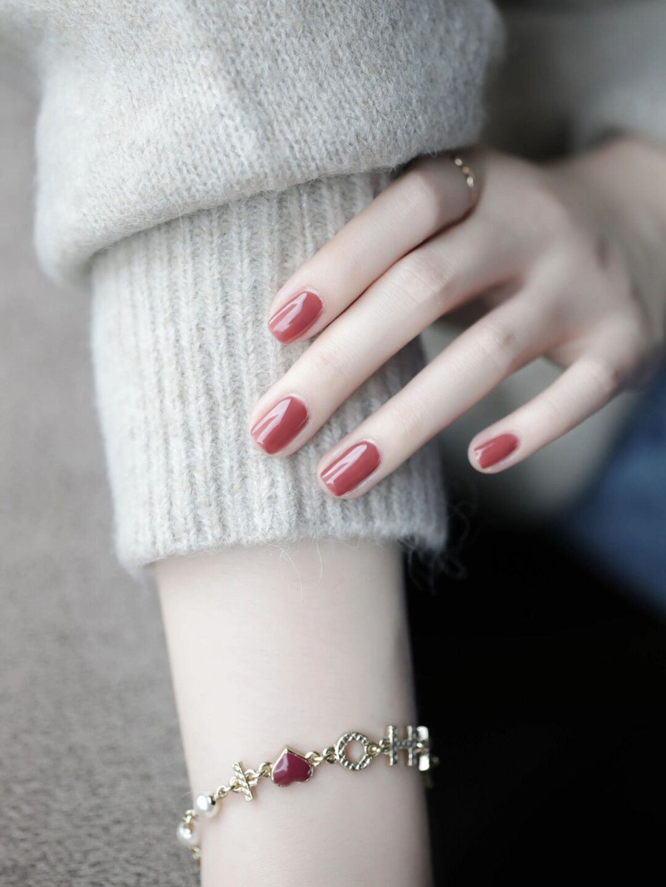 Red square nails with a simple glossy finish.