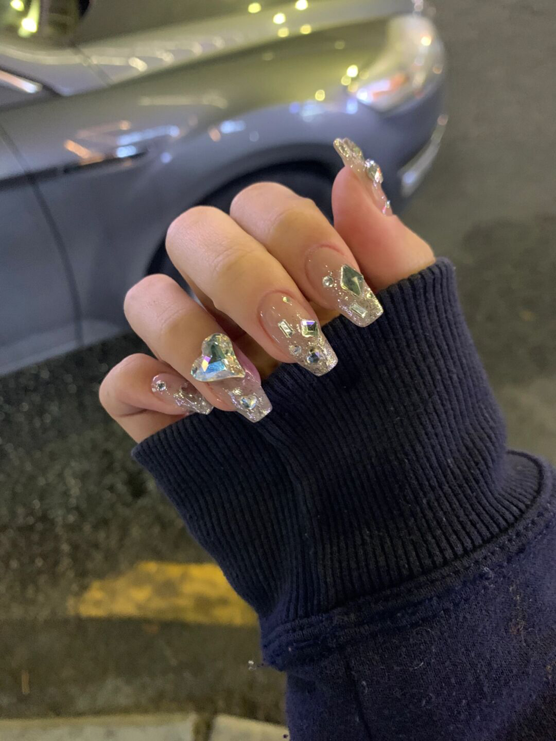Silver and Nude Glitter Long Square Nails shown as a nail art design with silver, nude, 3d, glitter, square and long details.