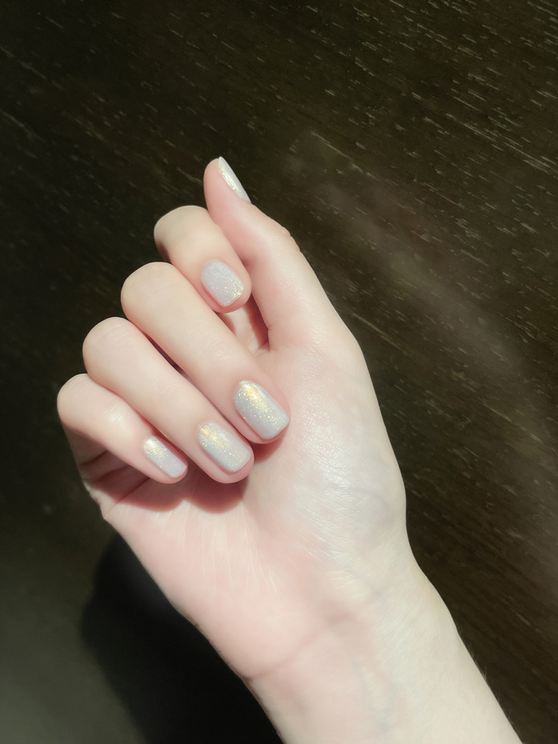 Nude Glitter Short Almond Nails shown as a nail art design with nude, glitter, elegant, almond and short details.
