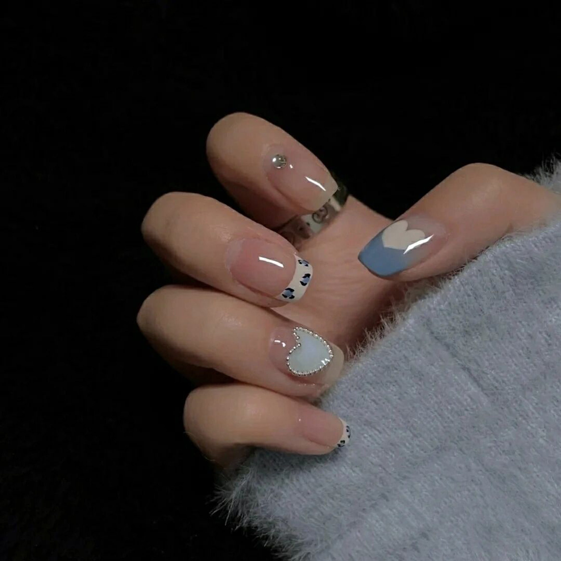 White and Blue Heart Square Nails shown as a nail art design with white, blue, cute, elegant, heart, square and medium details.
