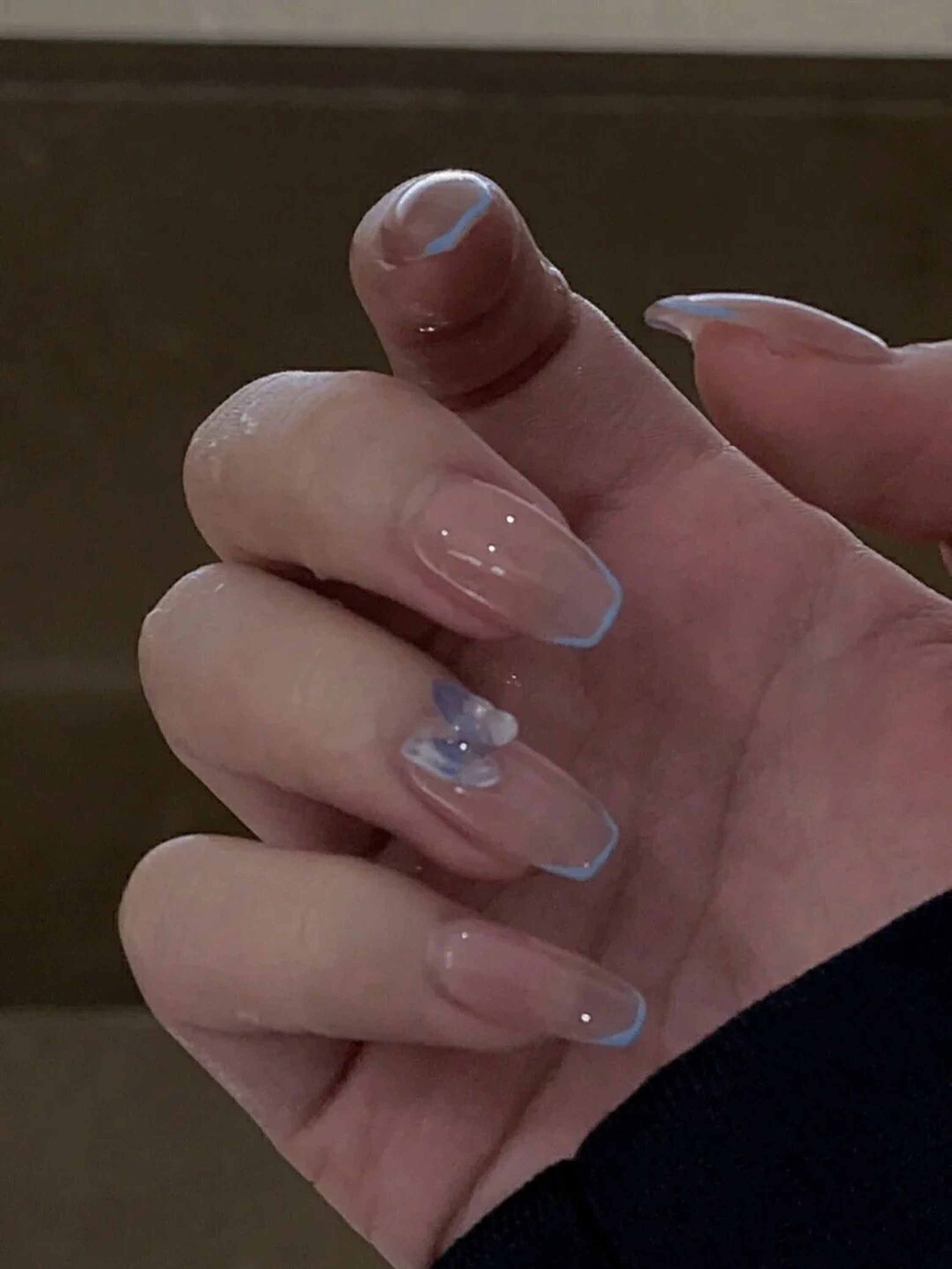 Baby Blue Floral Coffin Nails shown as a nail art design with baby blue, flower, coffin and medium details.