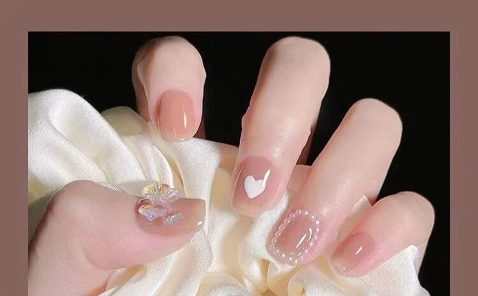 Nude and White Heart Square Nails shown as a nail art design with nude, white, elegant, simple, heart, square and medium details.