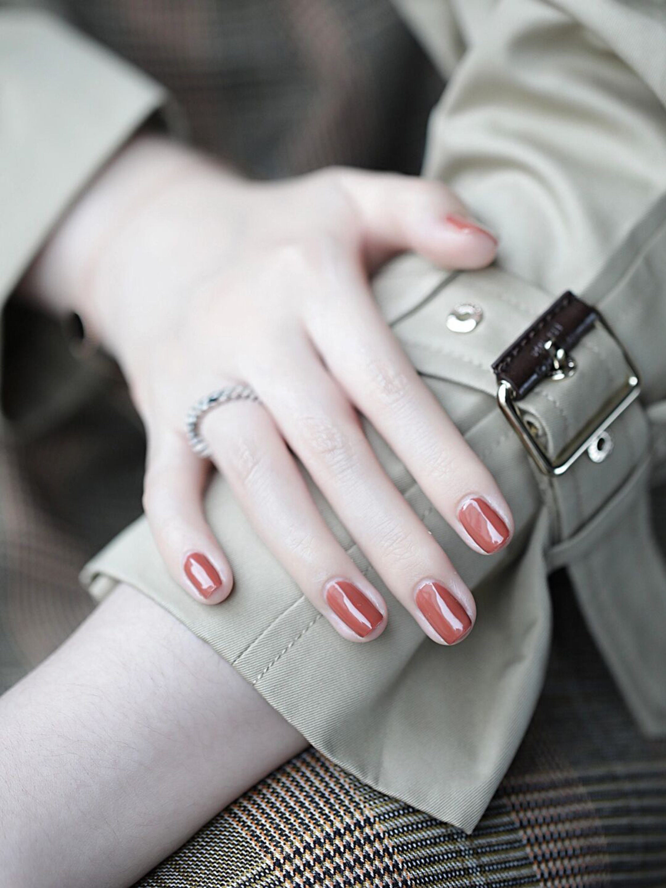 Red short square nails with a clean glossy finish.