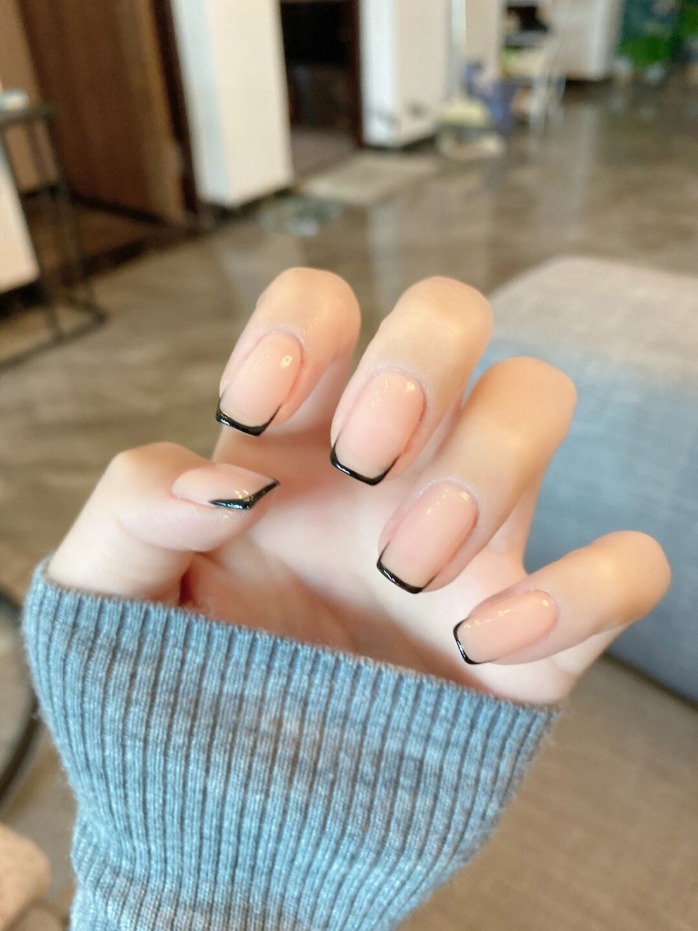 Black and Nude French Tip Square Nails shown as a nail art design with black, nude, french, elegant, minimal, square and medium details.
