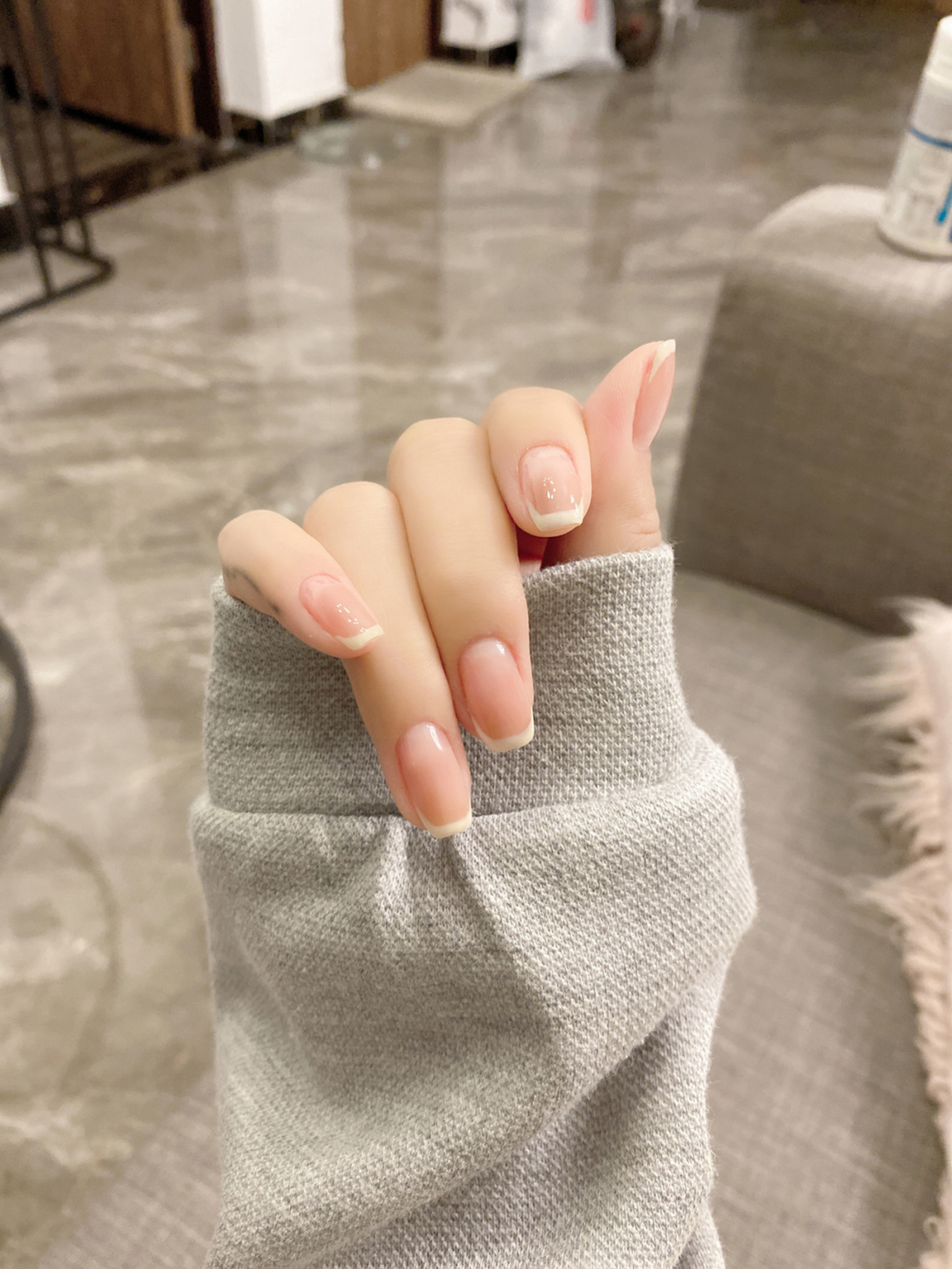 medium almond nude pink nail design with simple and elegant and gel details