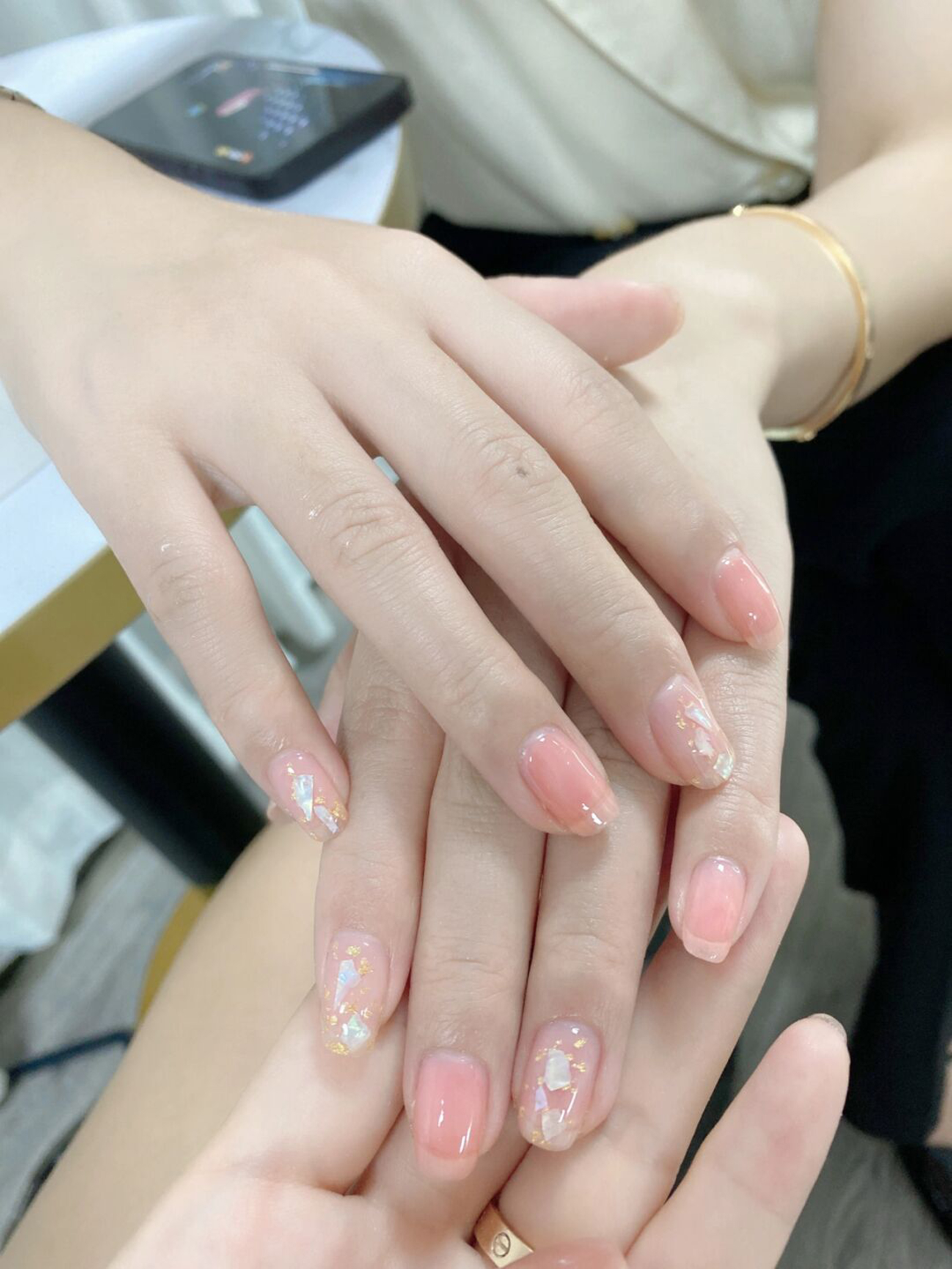 short oval pink gold nail design with glitter and gel and cute details