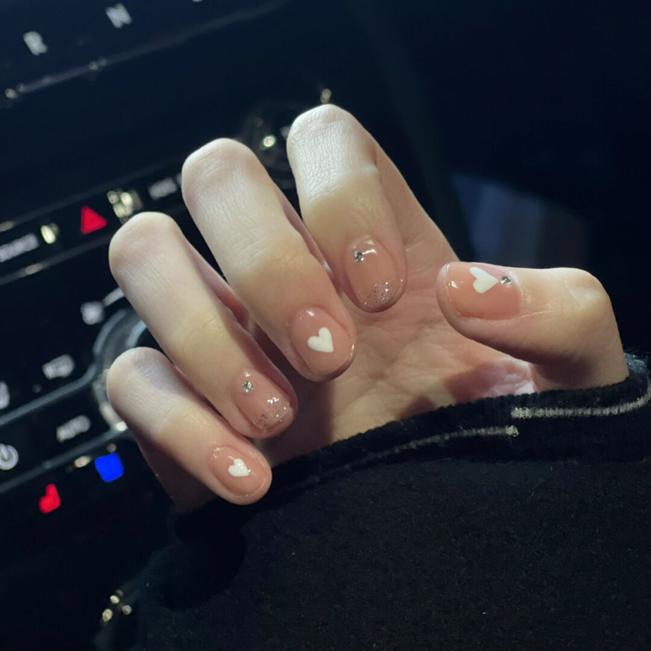 White and Nude Heart Short Nails shown as a nail art design with white, nude, simple, cute, heart and short details.