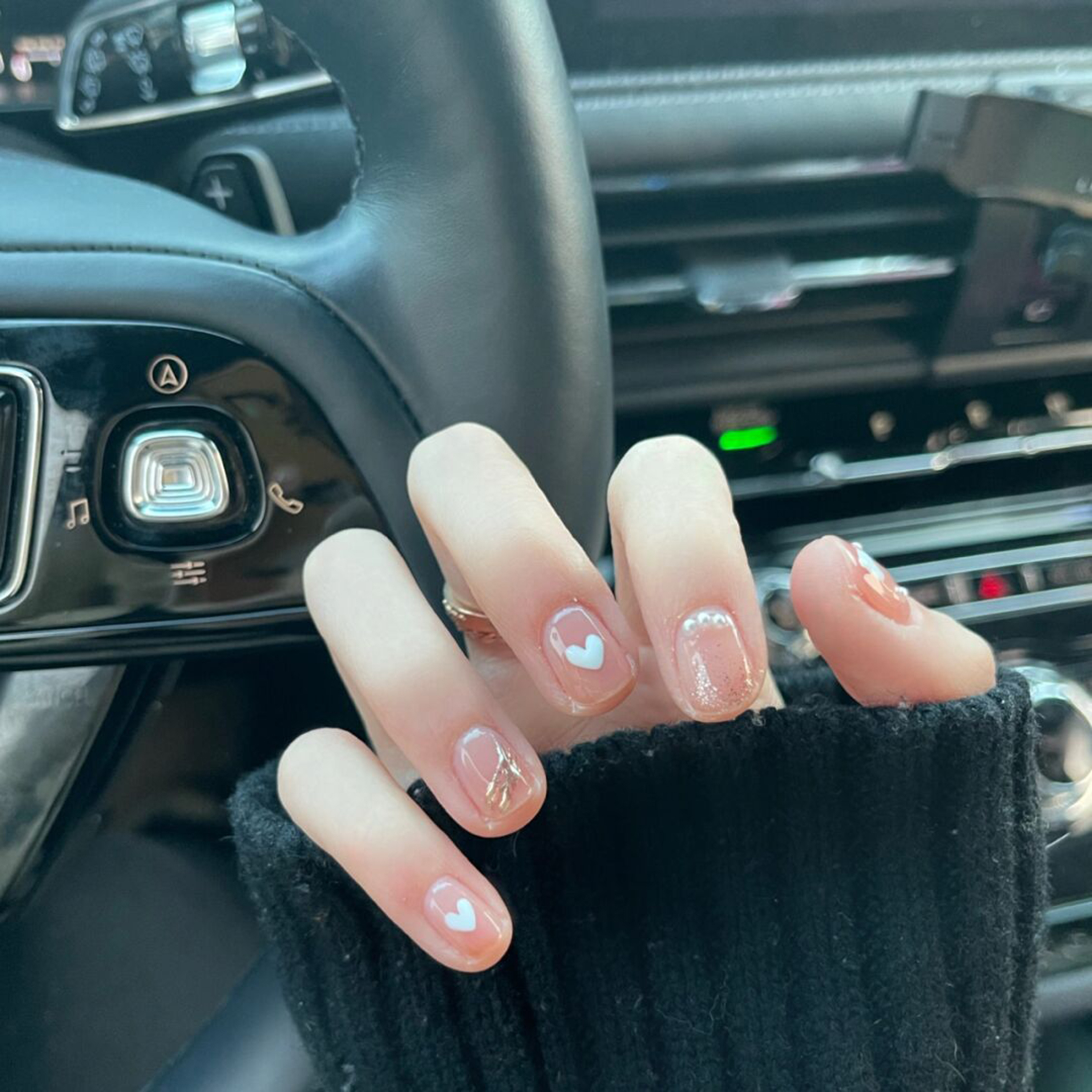 White and Nude Heart Short Nails shown as a nail art design with white, nude, cute, simple, heart and short details.