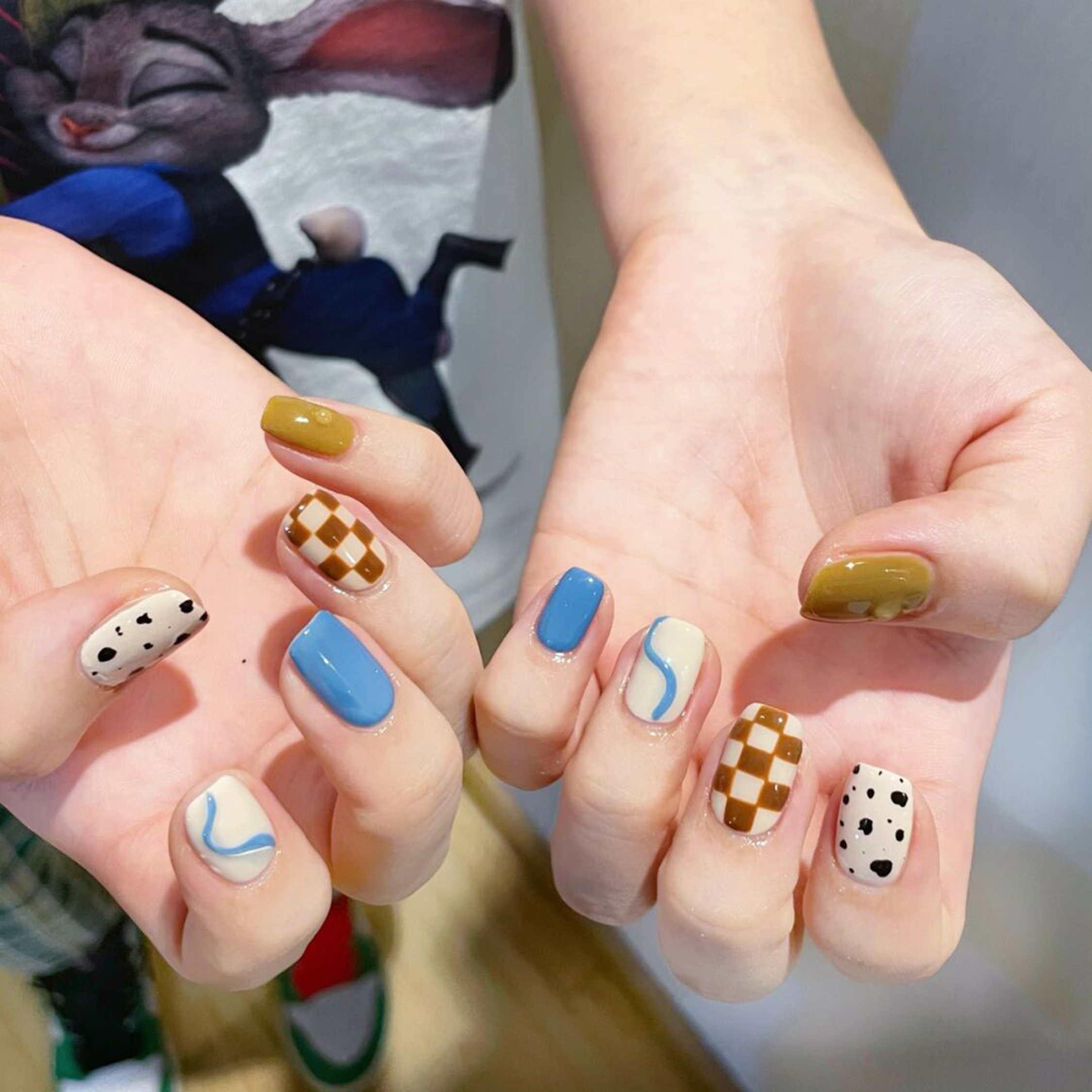 Blue, Brown and White Checkerboard Short Square Nails shown as a nail art design with blue, brown, white, cute, checkerboard, square and short details.