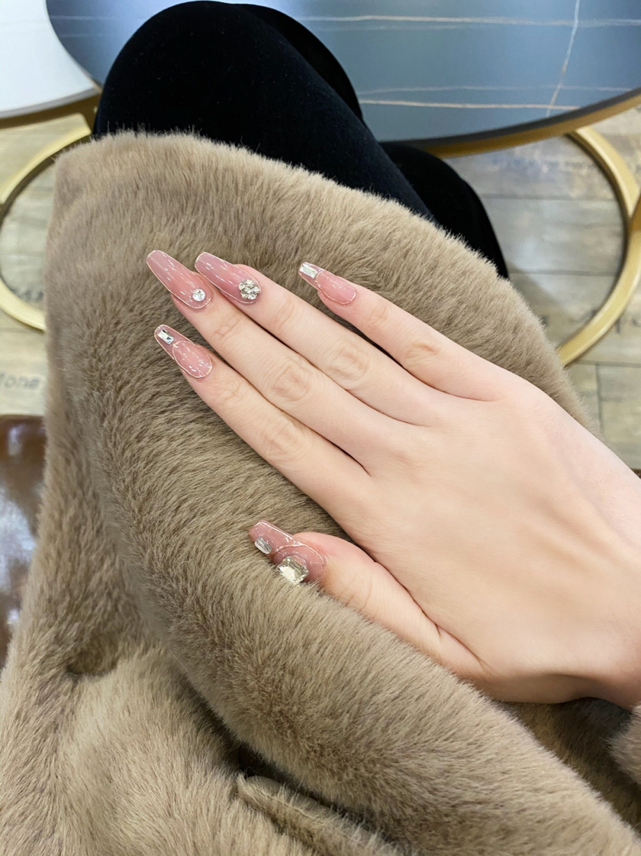 Nude Glitter Long Almond Nails shown as a nail art design with nude, elegant, glitter, almond and long details.