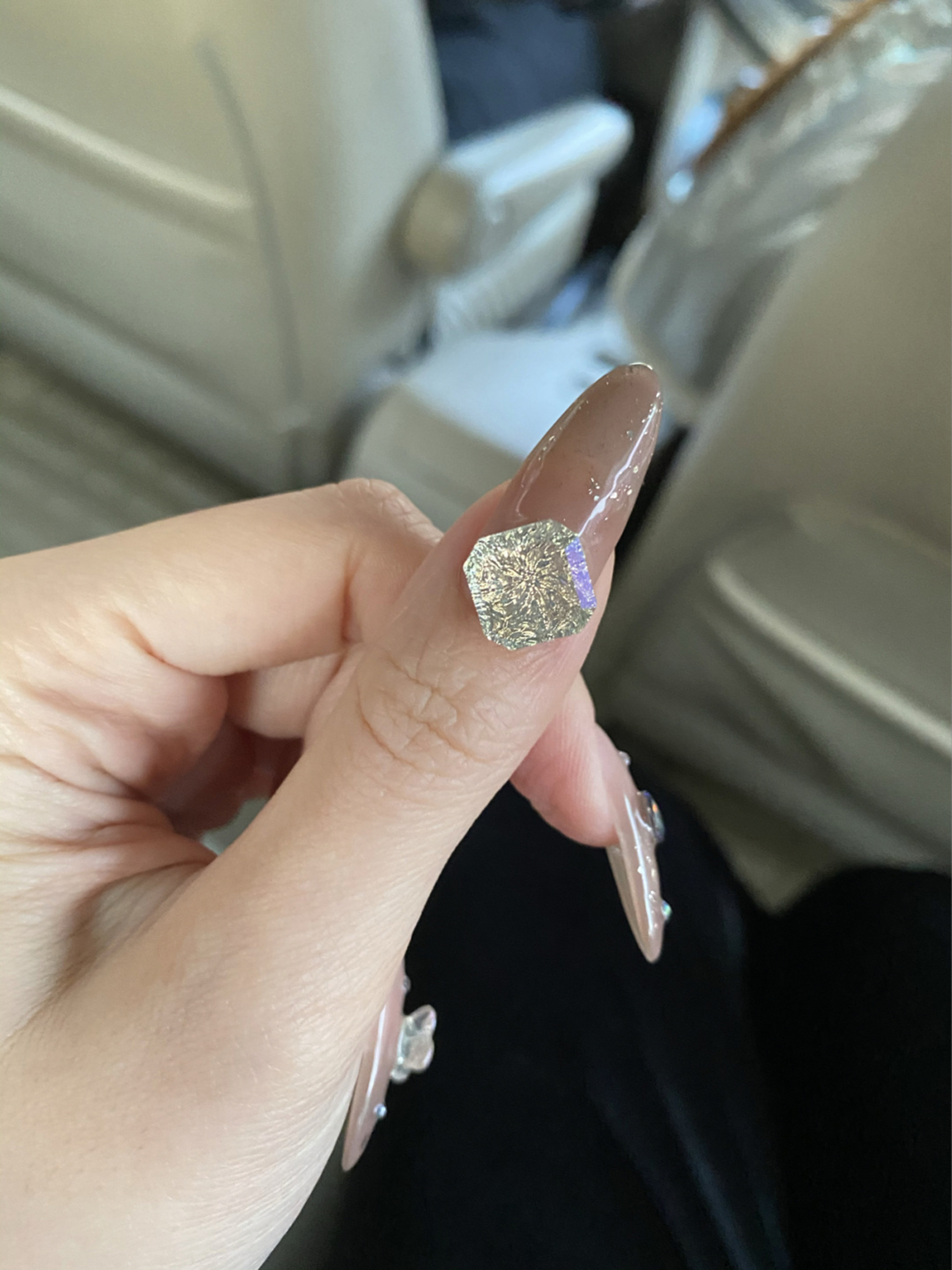 Nude Glitter Long Almond Nails shown as a nail art design with nude, elegant, glitter, minimal, almond and long details.