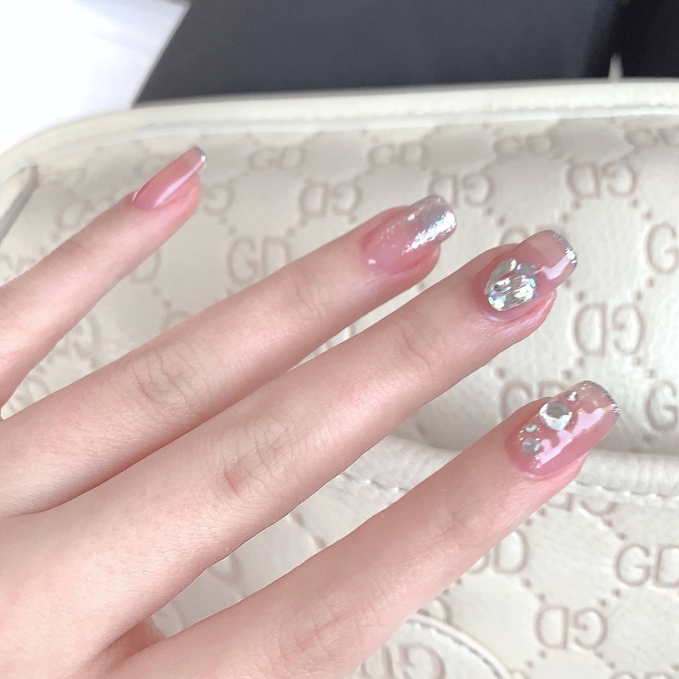 Nude Elegant Long Almond Nails shown as a nail art design with nude, elegant, almond and long details.