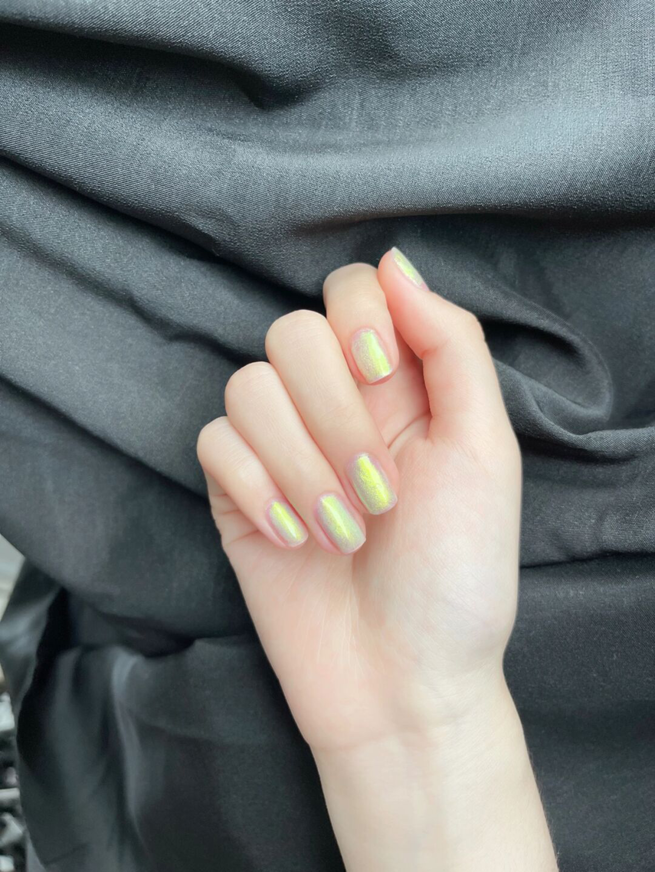 Yellow Chrome Short Round Nails shown as a nail art design with yellow, chrome, round and short details.