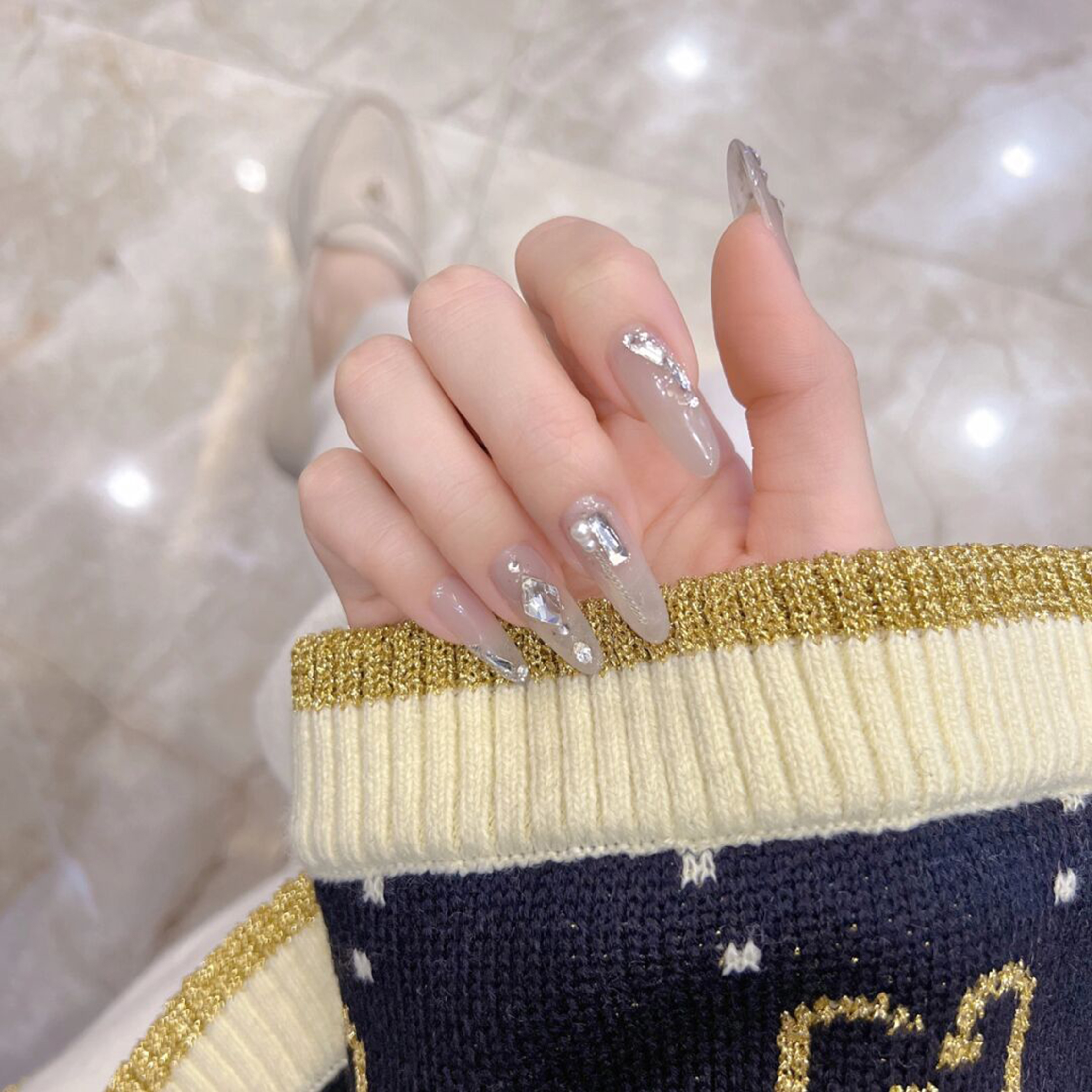 Nude Silver Chrome Long Almond Nails with nude, silver, chrome, glitter, elegant, almond and long details.