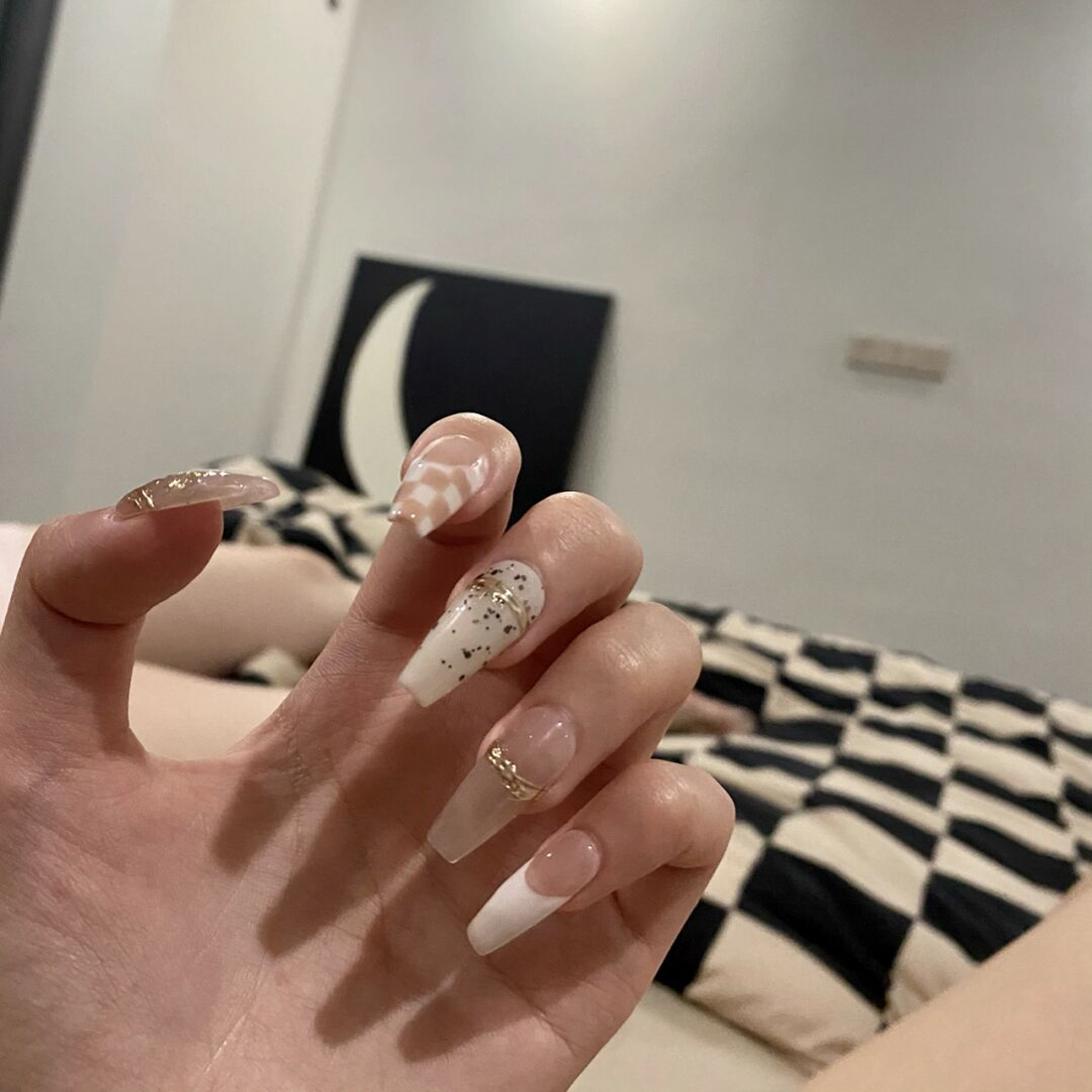 White Nude French Long Coffin Nails with white, nude, gold, french, elegant, coffin and long details.