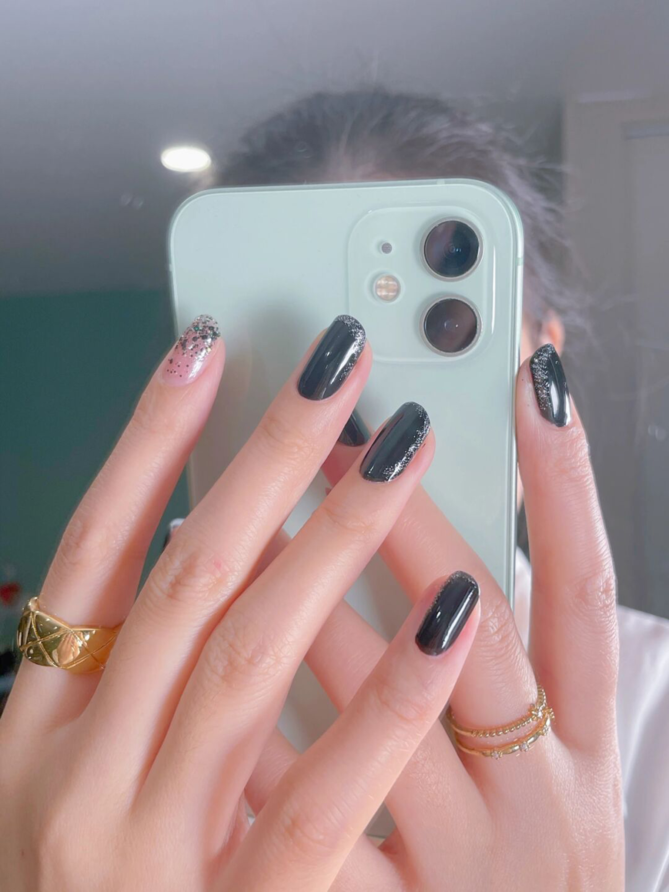 Pink and Black Ombre Short Round Nails shown as a nail art design with pink, black, glitter, ombre, round and short details.