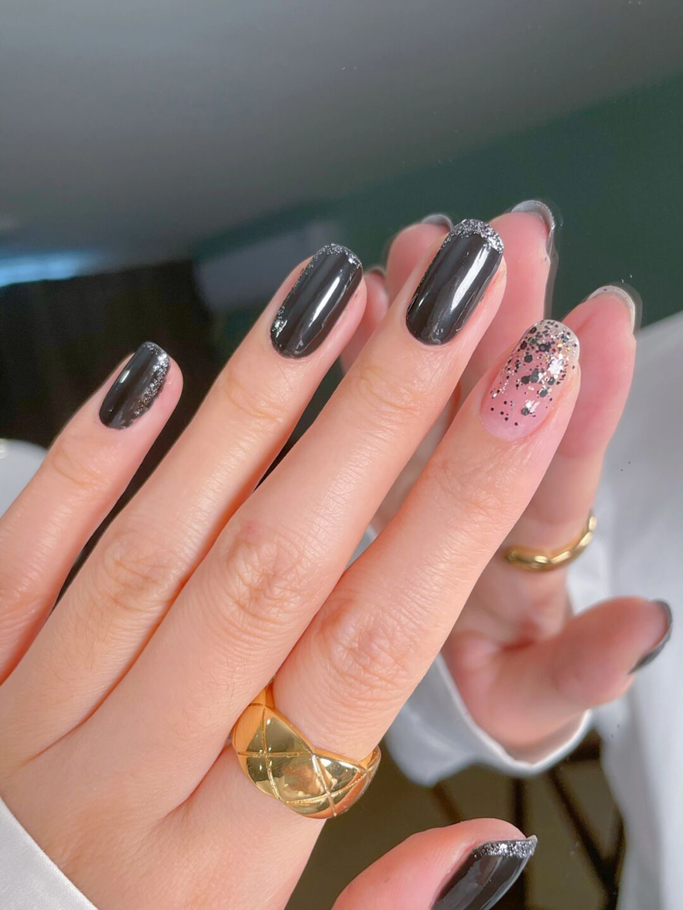 Black Simple Short Round Nails shown as a nail art design with black, simple, gel, round and short details.
