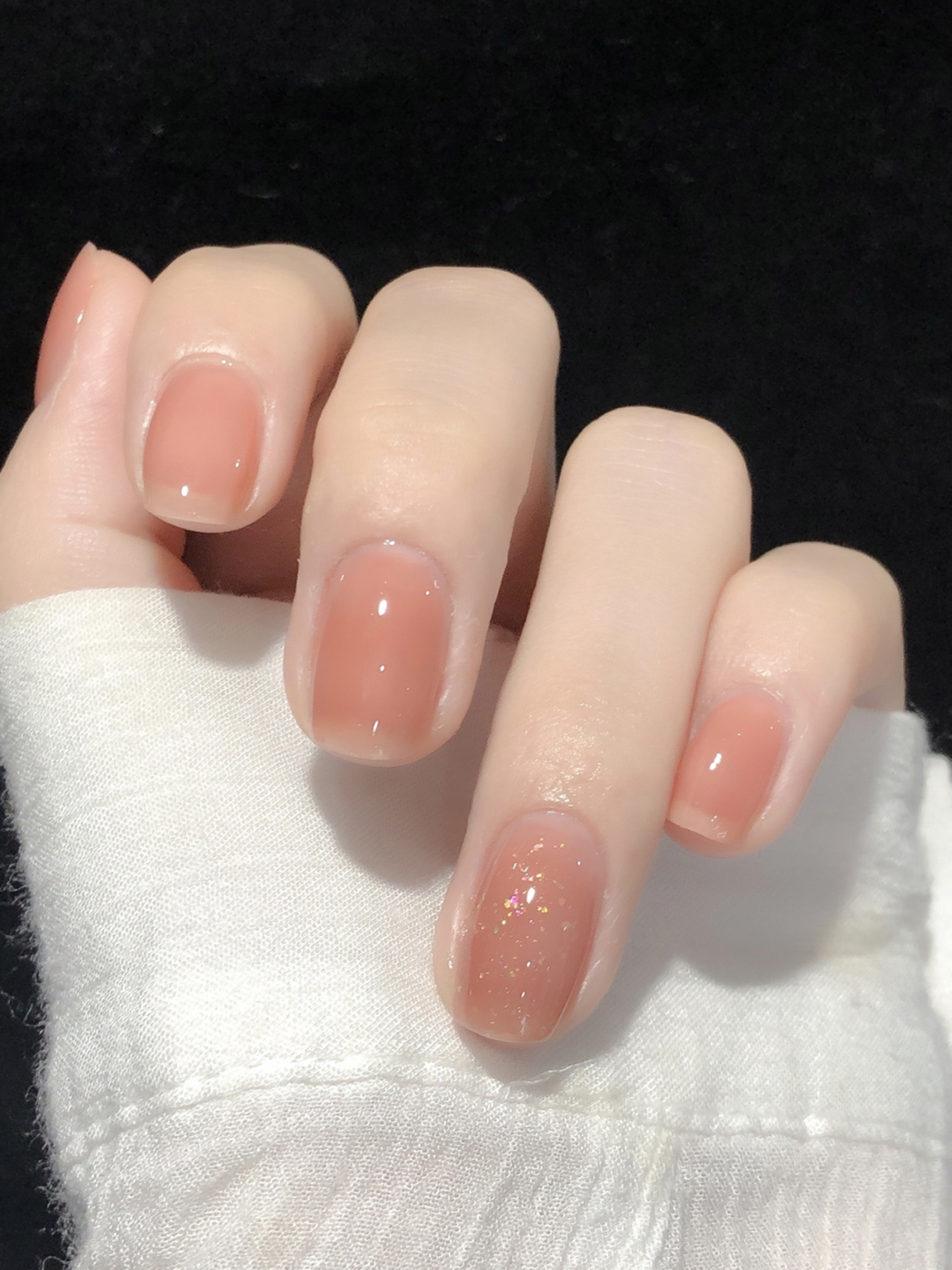 Nude Glitter Short Nails shown as a nail art design with nude, elegant, simple, glitter and short details.