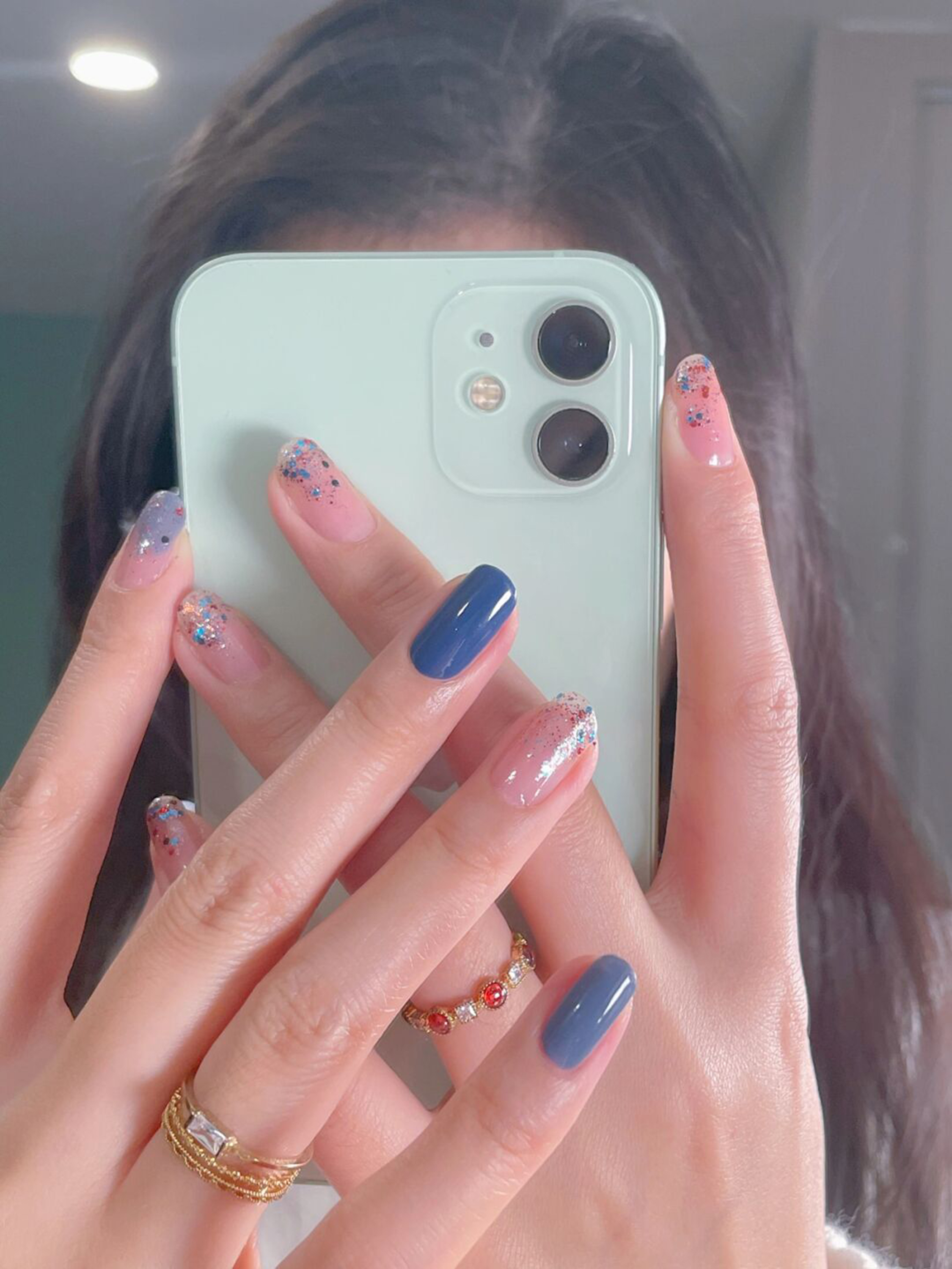 Blue Glitter Short Round Nails shown as a nail art design with blue, glitter, simple, round and short details.