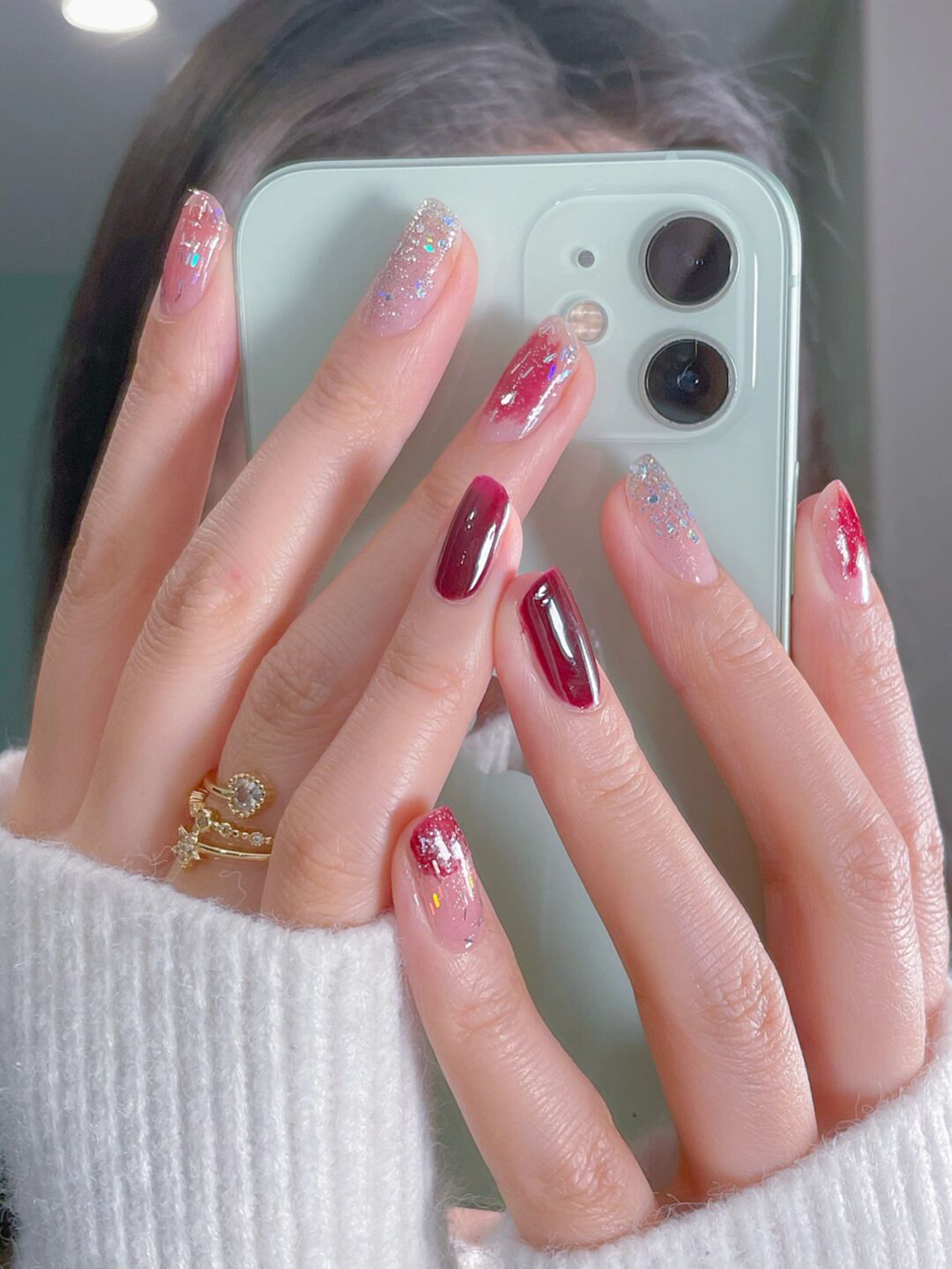 Red Ombre Short Round Nails shown as a nail art design with red, glitter, ombre, round and short details.