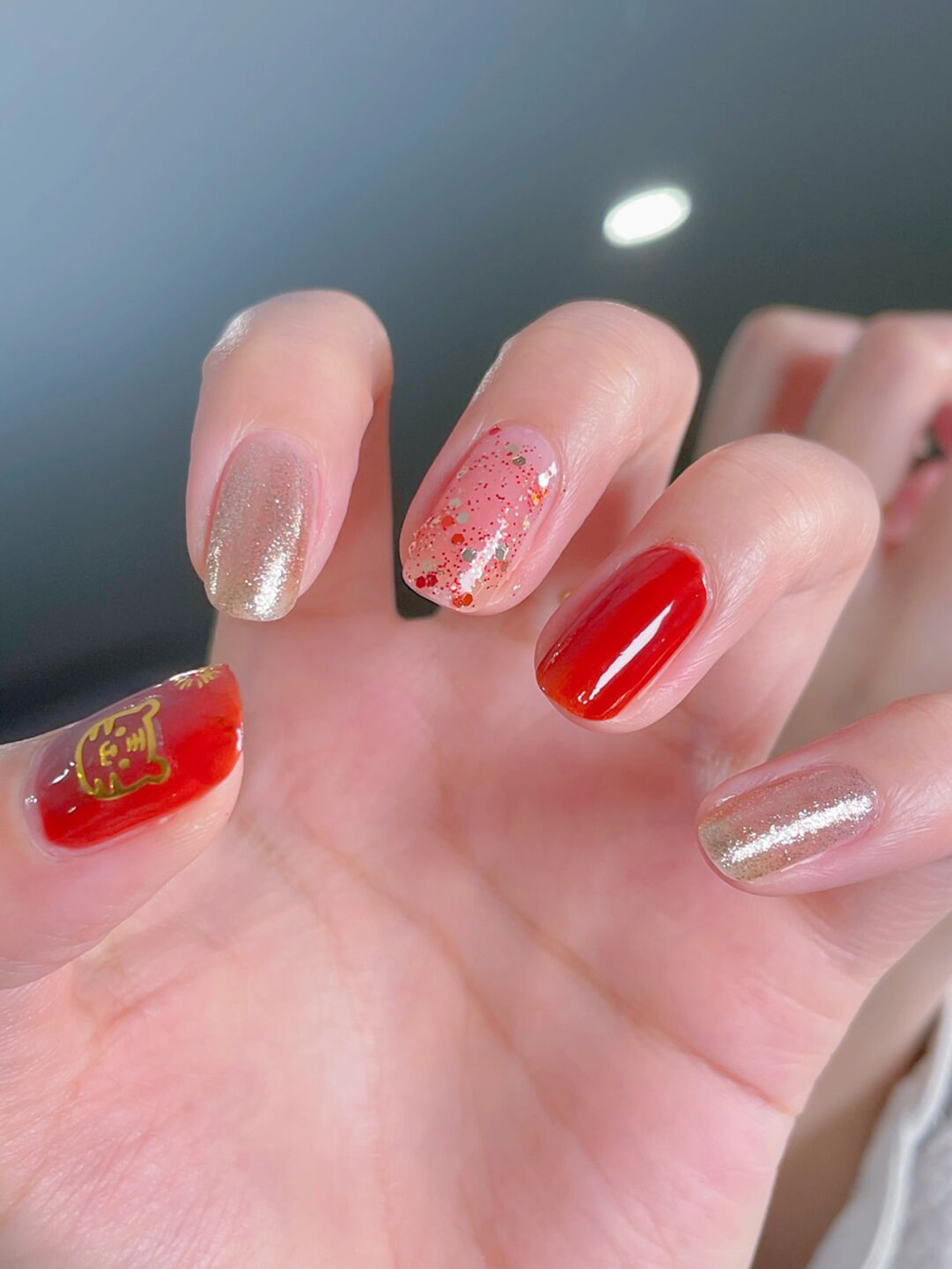 Red Glitter Short Round Nails shown as a nail art design with red, glitter, simple, round and short details.