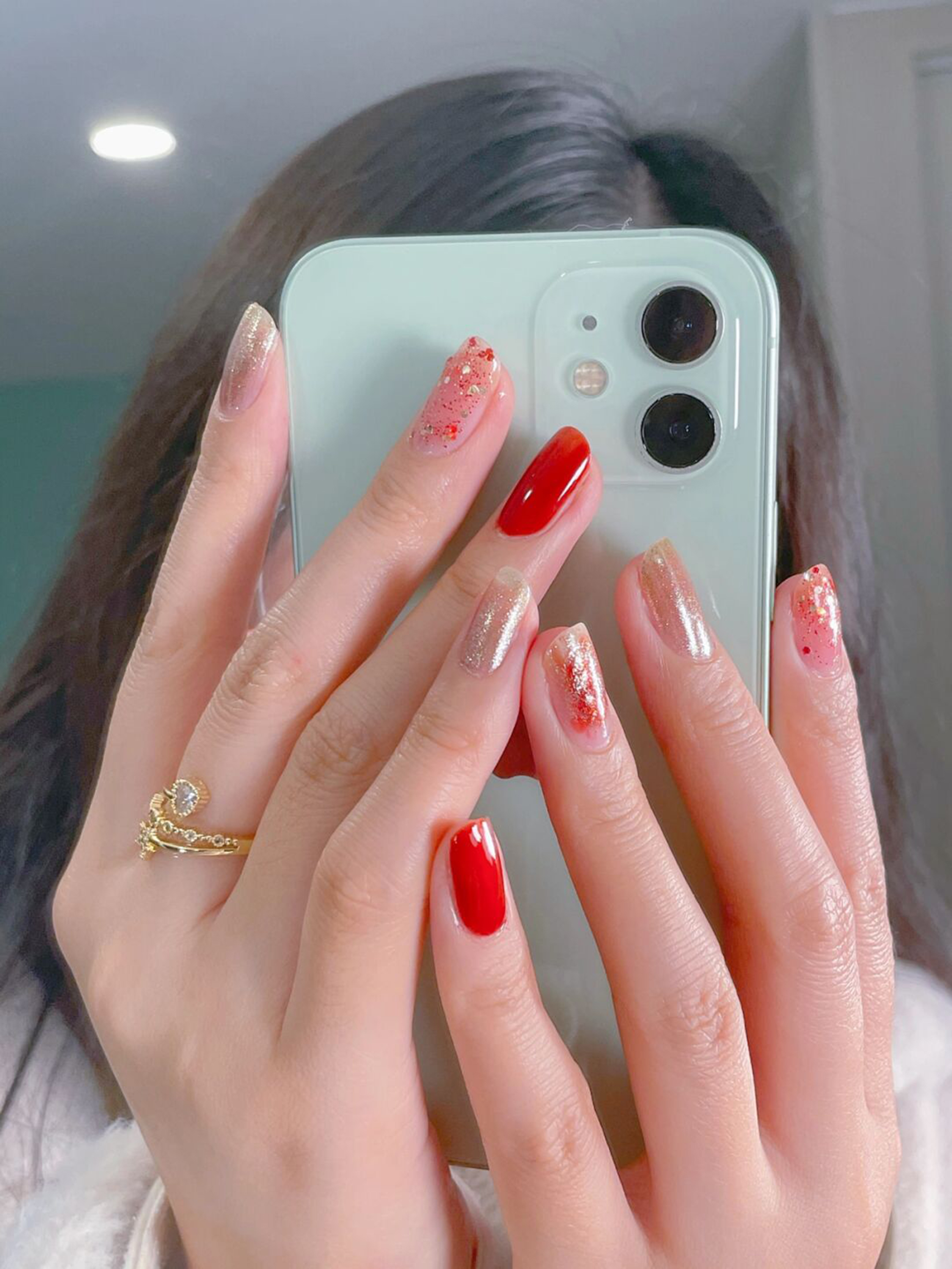 Red Ombre Short Round Nails shown as a nail art design with red, glitter, ombre, round and short details.
