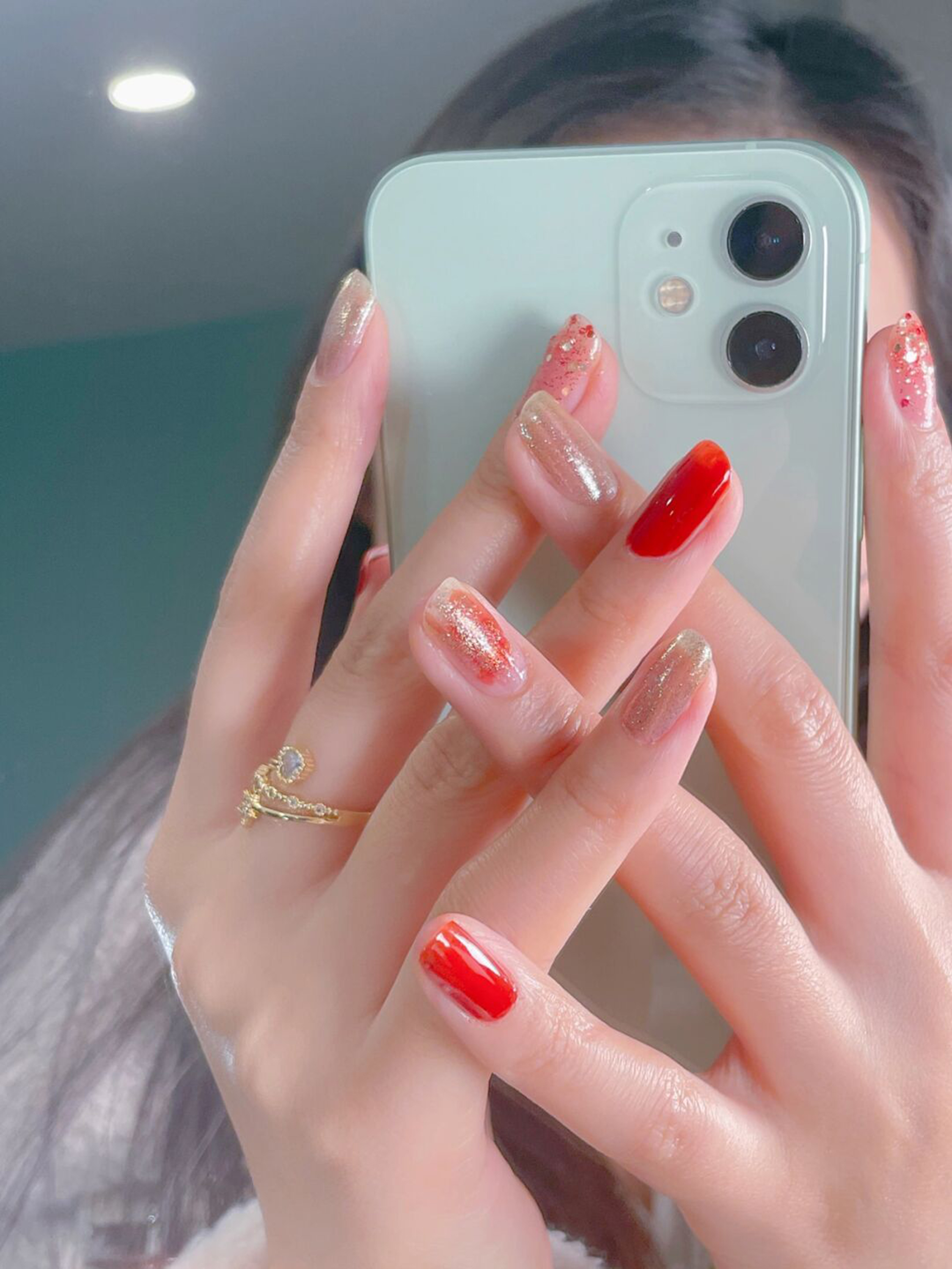 Red Ombre Short Round Nails shown as a nail art design with red, glitter, ombre, round and short details.