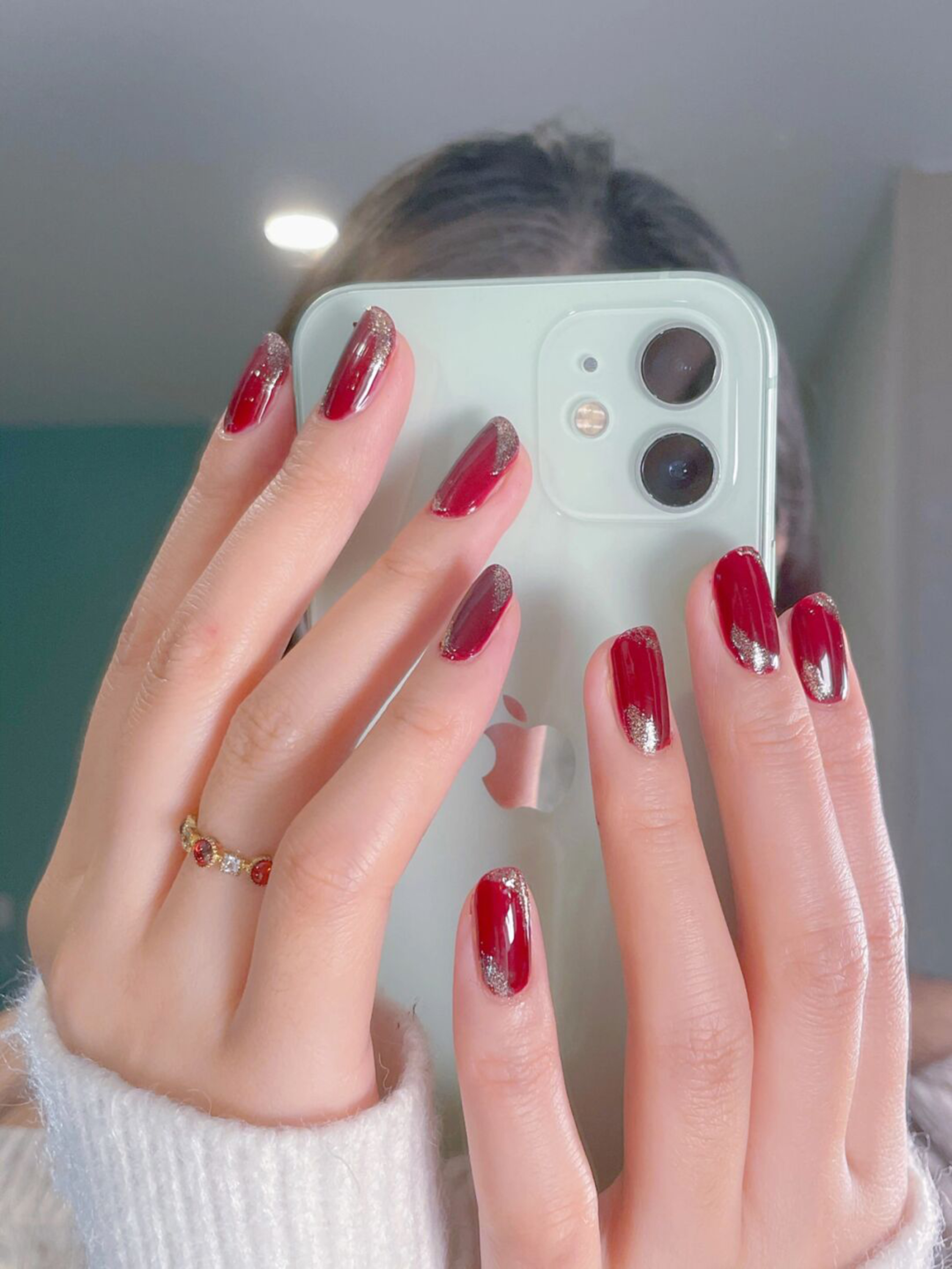 Red Ombre Short Round Nails shown as a nail art design with red, glitter, ombre, round and short details.