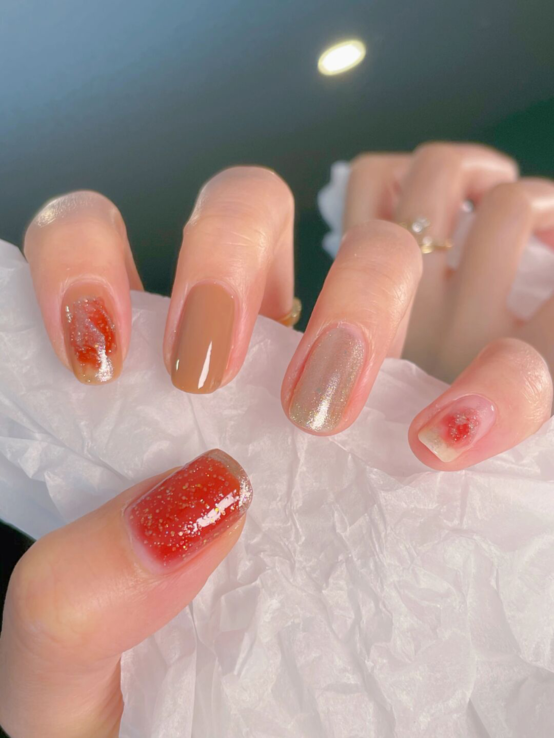 Nude and Red Simple Short Round Nails shown as a nail art design with nude, red, simple, gel, round and short details.