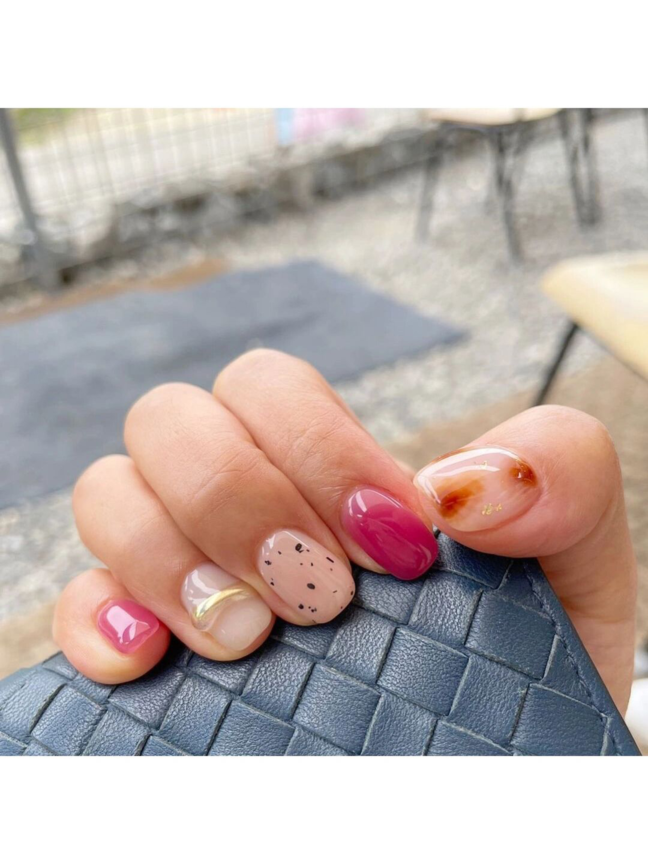 Pink and Brown Abstract Short Round Nails shown as a nail art design with pink, brown, gel, abstract, round and short details.