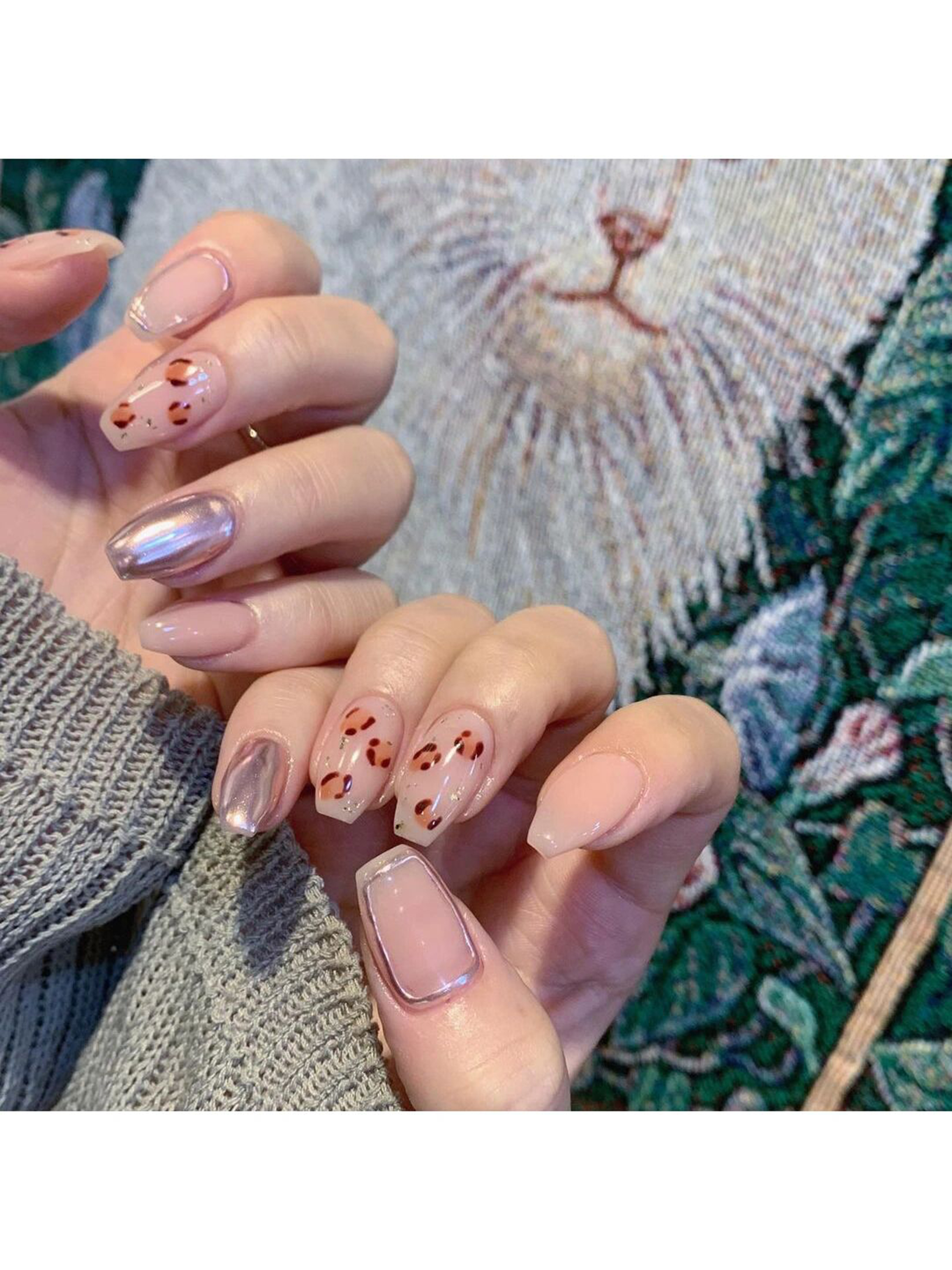 Nude and Pink Floral Short Round Nails shown as a nail art design with nude, pink, chrome, floral, cute, flower, round and short details.
