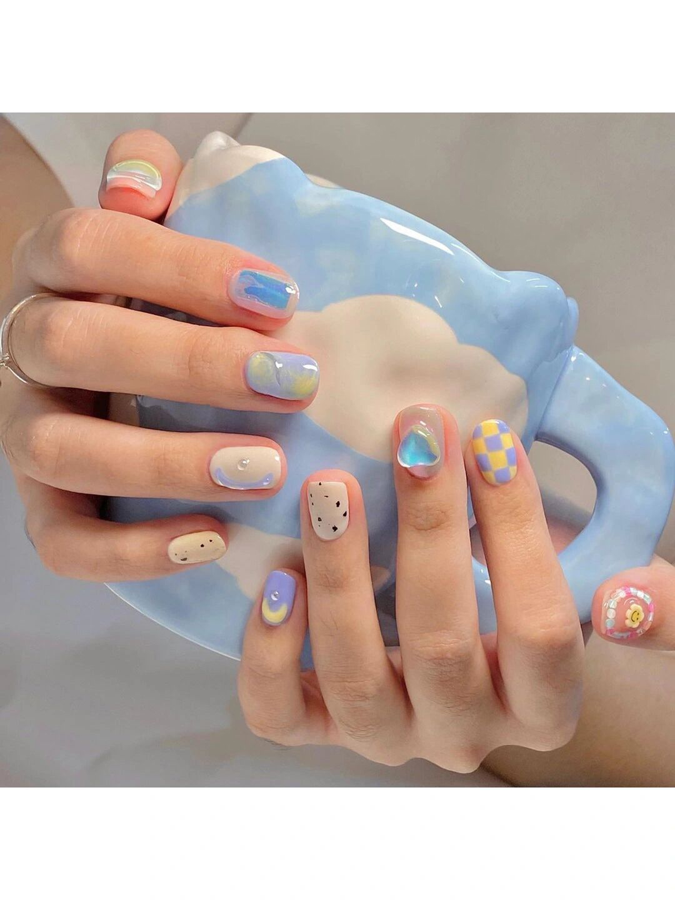 Pastel, Blue and Pink Cute Short Round Nails shown as a nail art design with pastel, blue, pink, cute, gel, round and short details.
