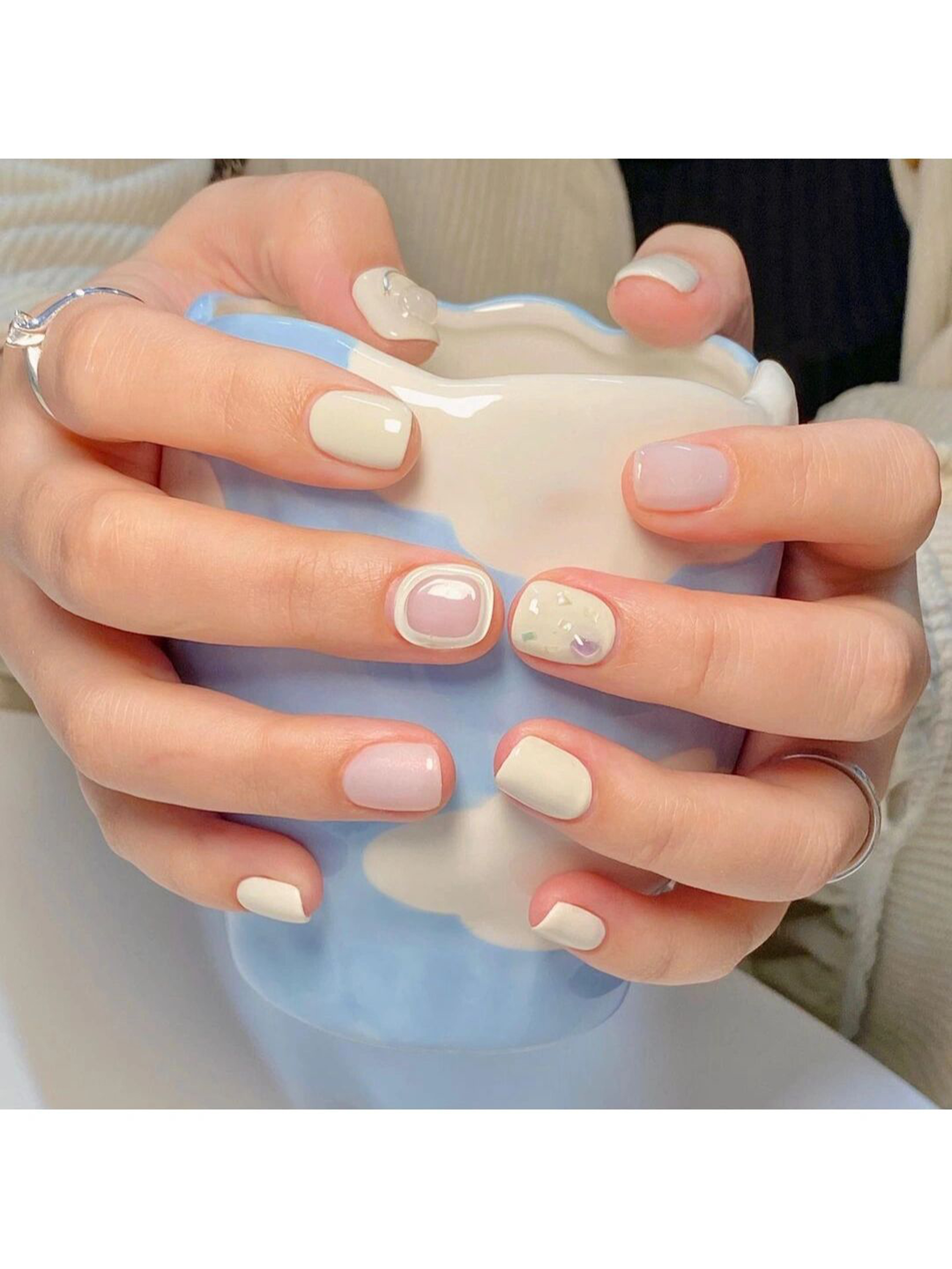 Pastel, Pink and Blue Minimal Short Round Nails shown as a nail art design with pastel, pink, blue, minimal, gel, round and short details.