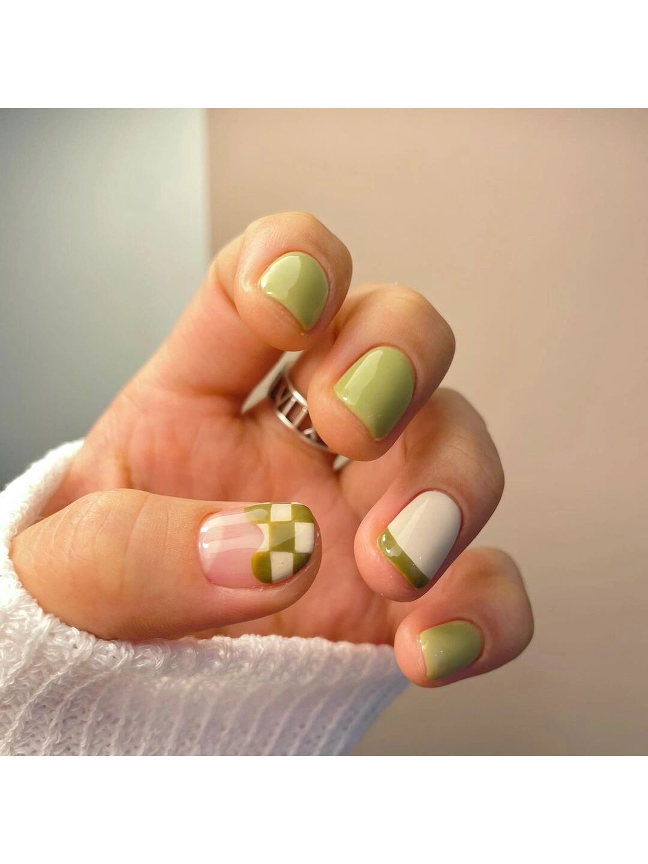 Green and White Checkerboard Short Round Nails shown as a nail art design with green, white, cute, aesthetic, checkerboard, flower, round and short details.