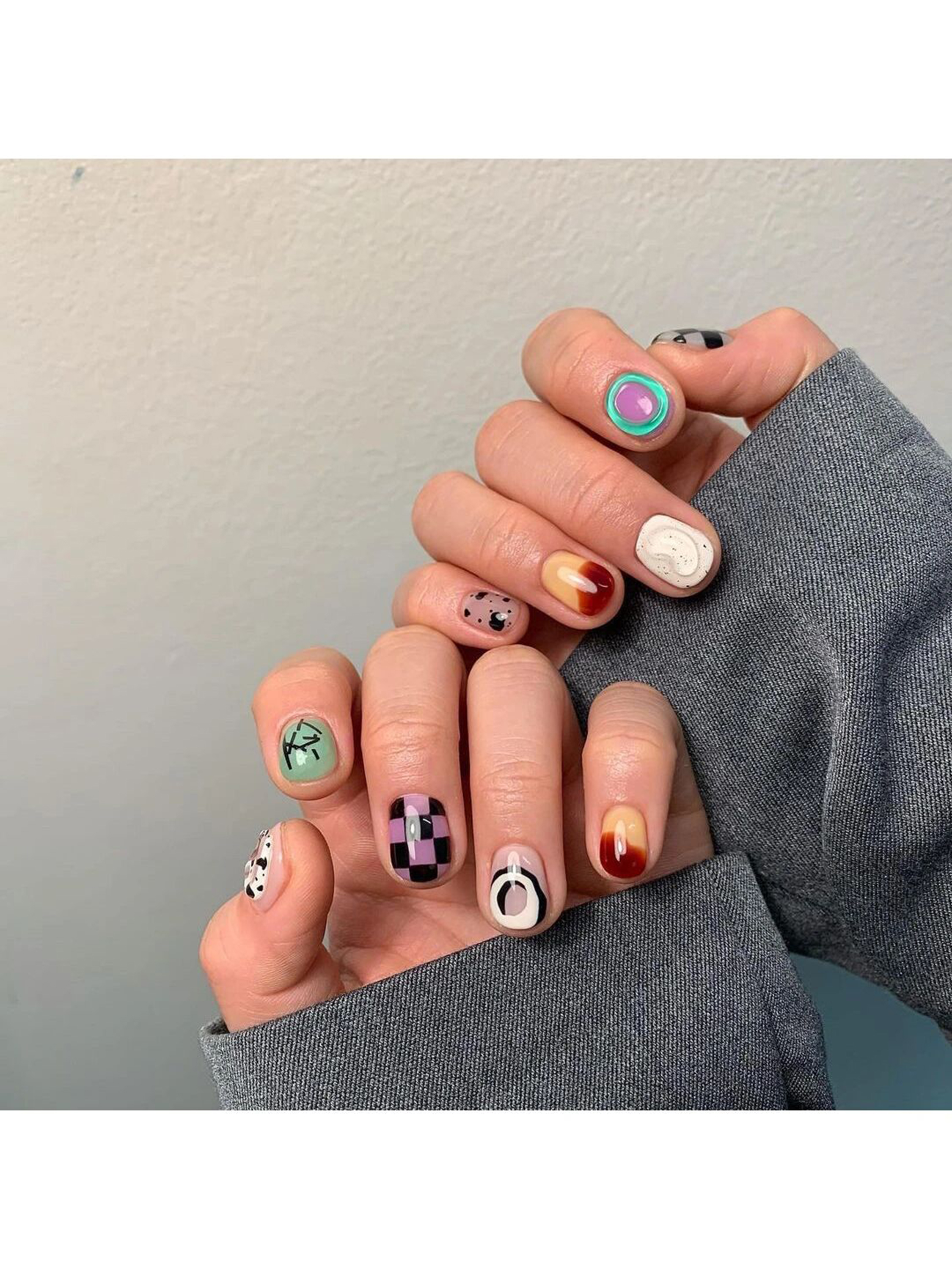 Brown, White and Green Polka Dot Short Round Nails shown as a nail art design with brown, white, green, aesthetic, checkerboard, polka dot, round and short details.