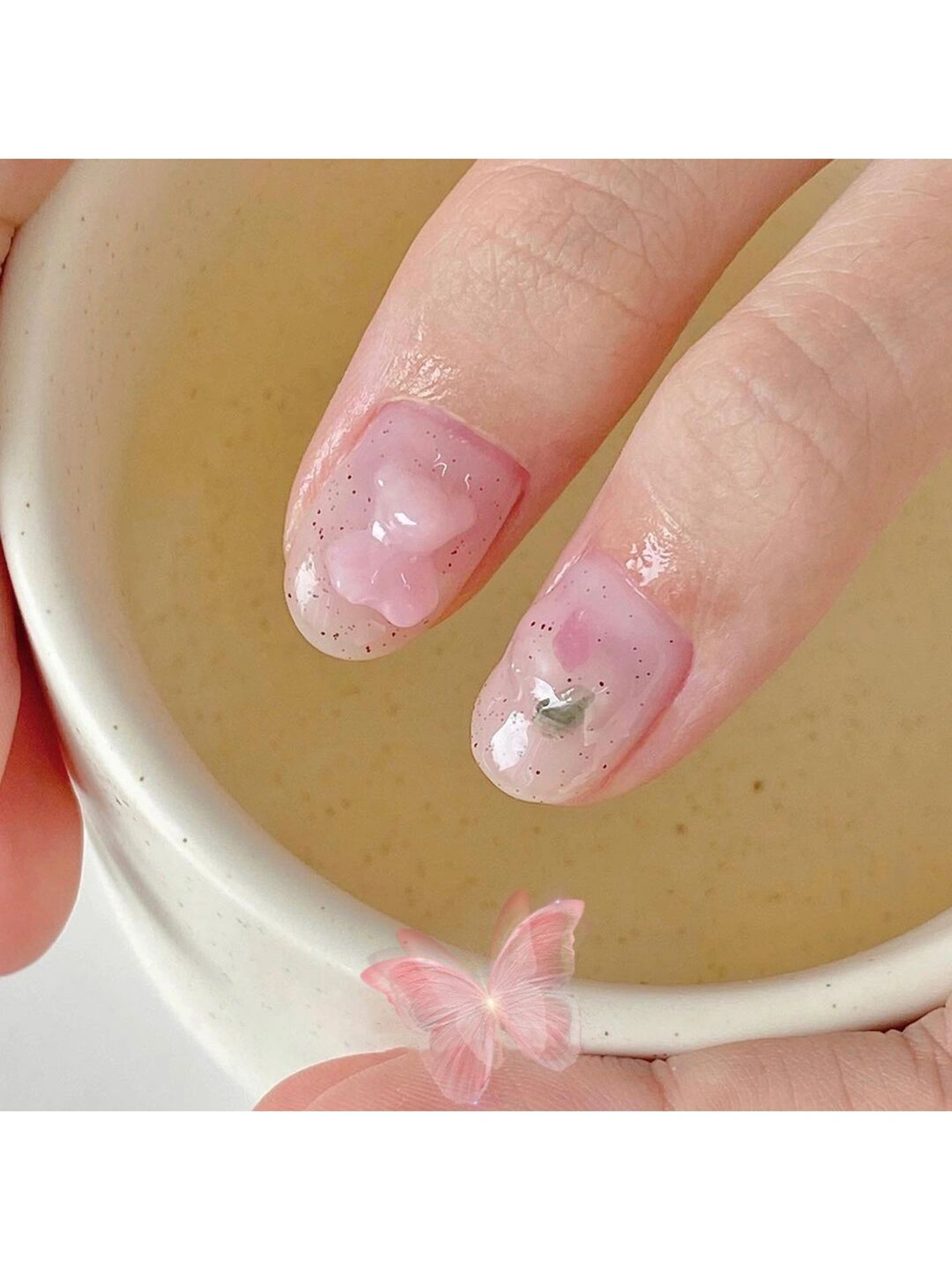 Pink and White Marble Short Round Nails shown as a nail art design with pink, white, marble, round and short details.
