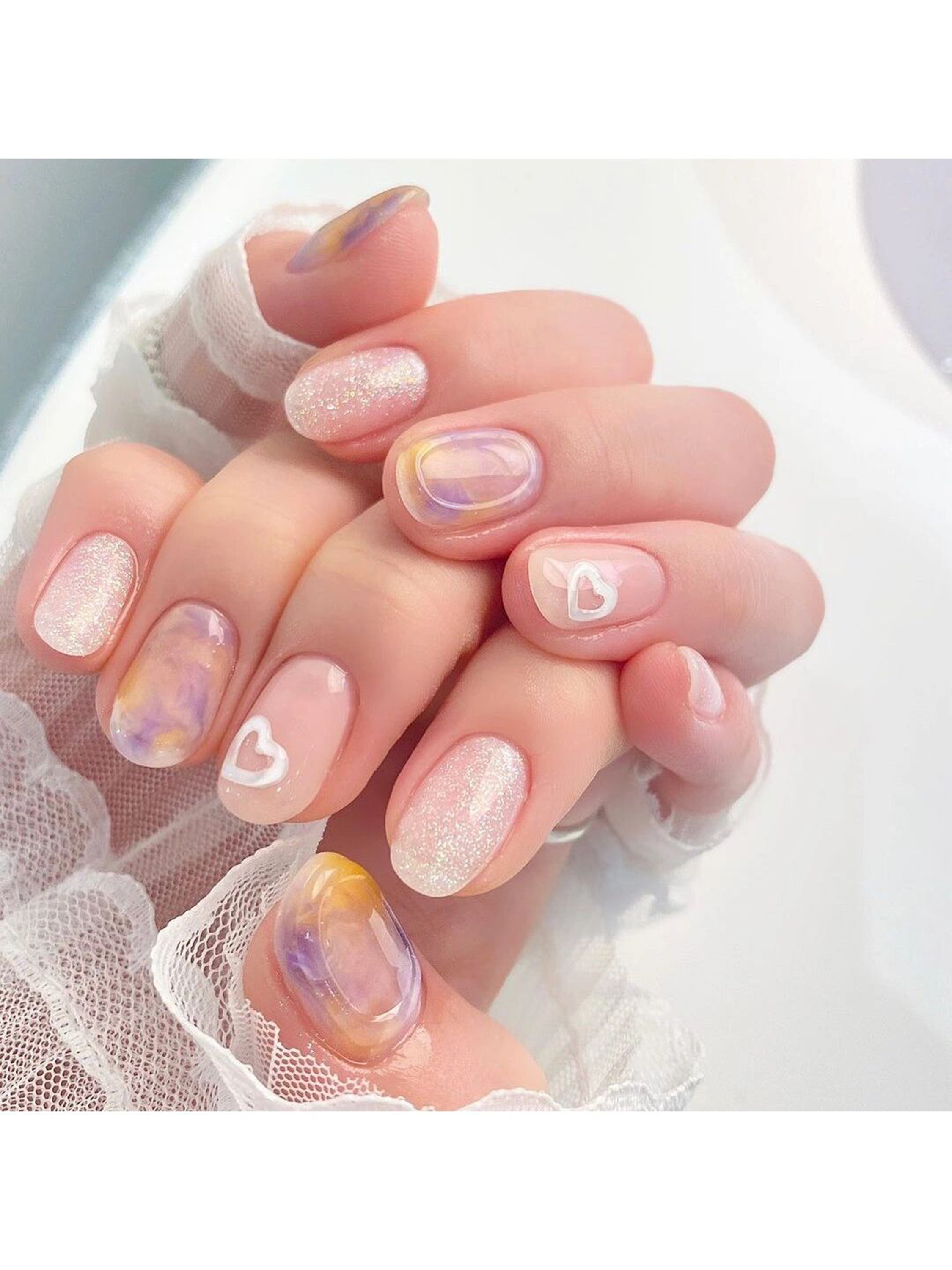 Pink and White Heart Short Round Nails shown as a nail art design with pink, white, cute, gel, heart, round and short details.