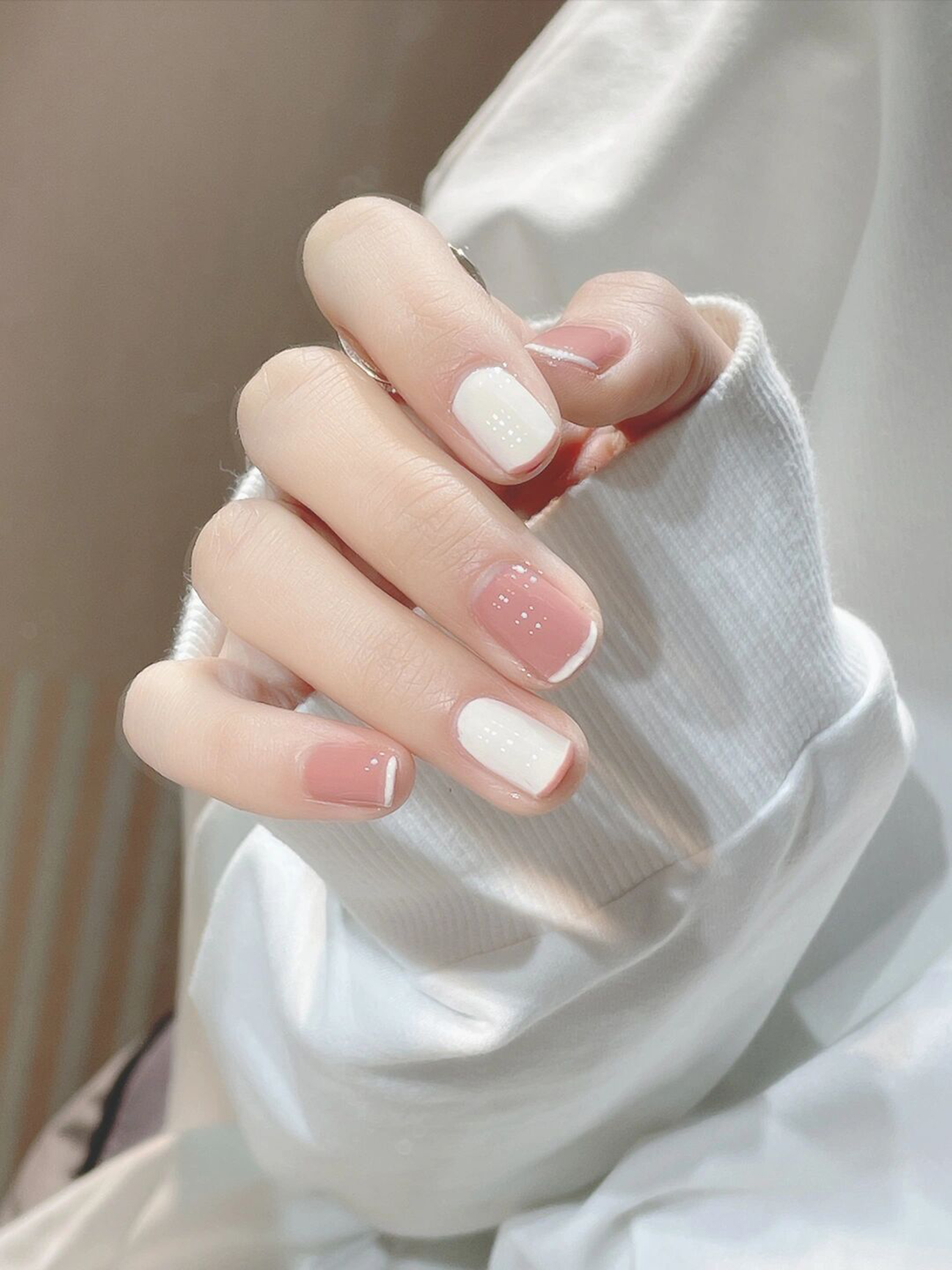 Pink and White Minimal Square Nails shown as a nail art design with pink, white, minimal, simple, elegant, square and medium details.