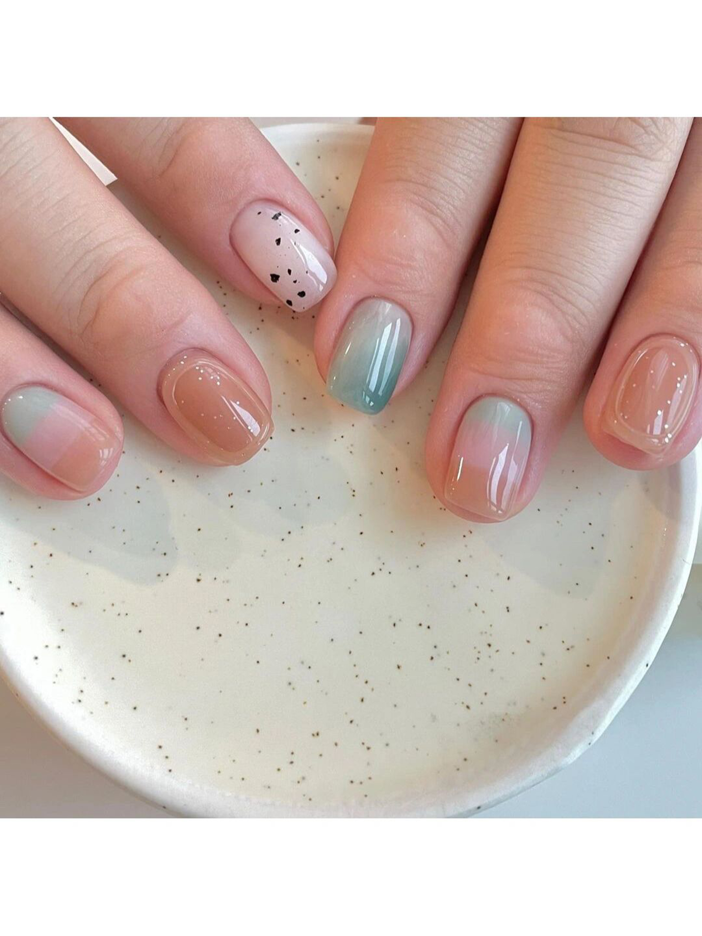 Pastel, Blue and Pink Polka Dot Short Round Nails shown as a nail art design with pastel, blue, pink, simple, cute, polka dot, round and short details.