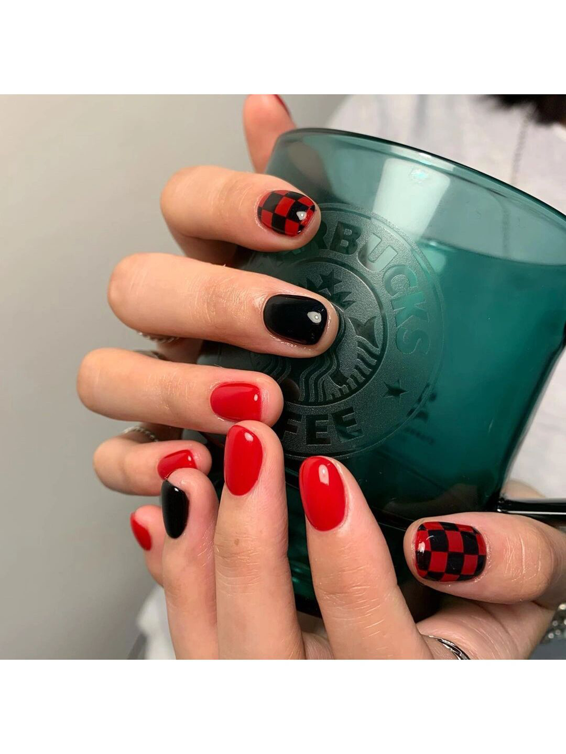 Red and Black Checkerboard Short Round Nails shown as a nail art design with red, black, aesthetic, checkerboard, round and short details.