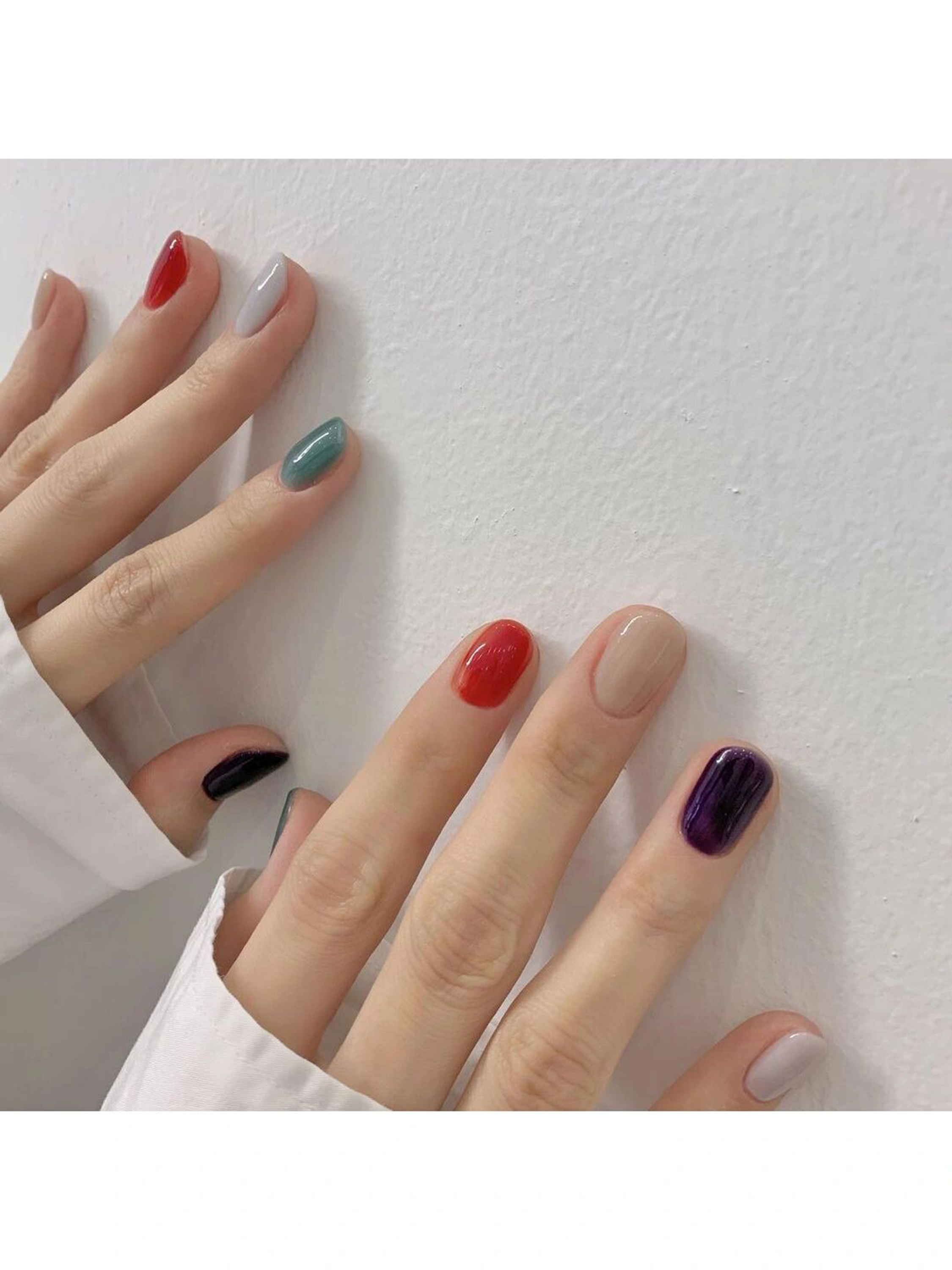 Red, Blue and Nude Simple Short Round Nails shown as a nail art design with red, blue, nude, simple, gel, round and short details.