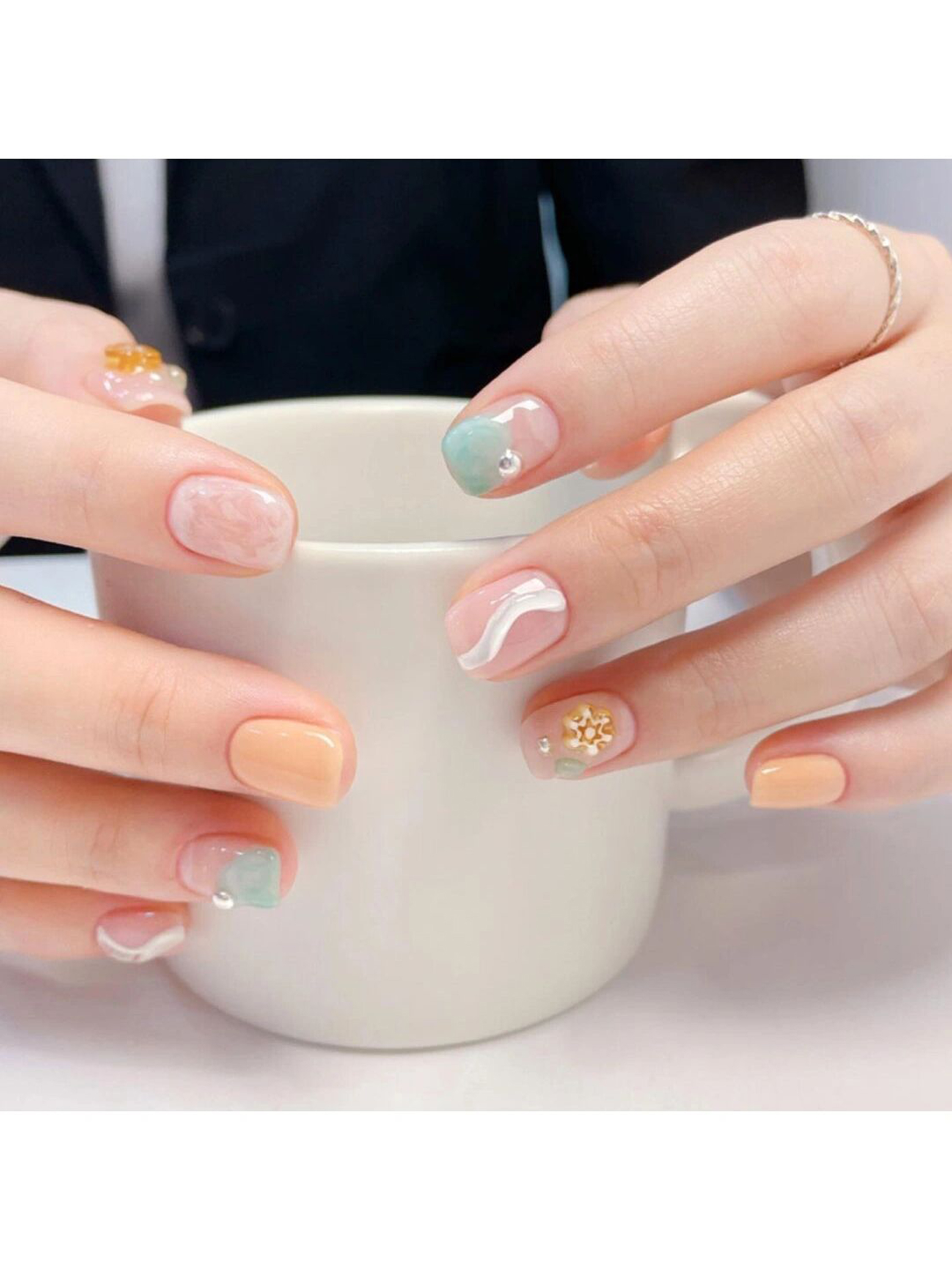 Pastel, Pink and Blue Floral Short Round Nails shown as a nail art design with pastel, pink, blue, cute, floral, flower, round and short details.