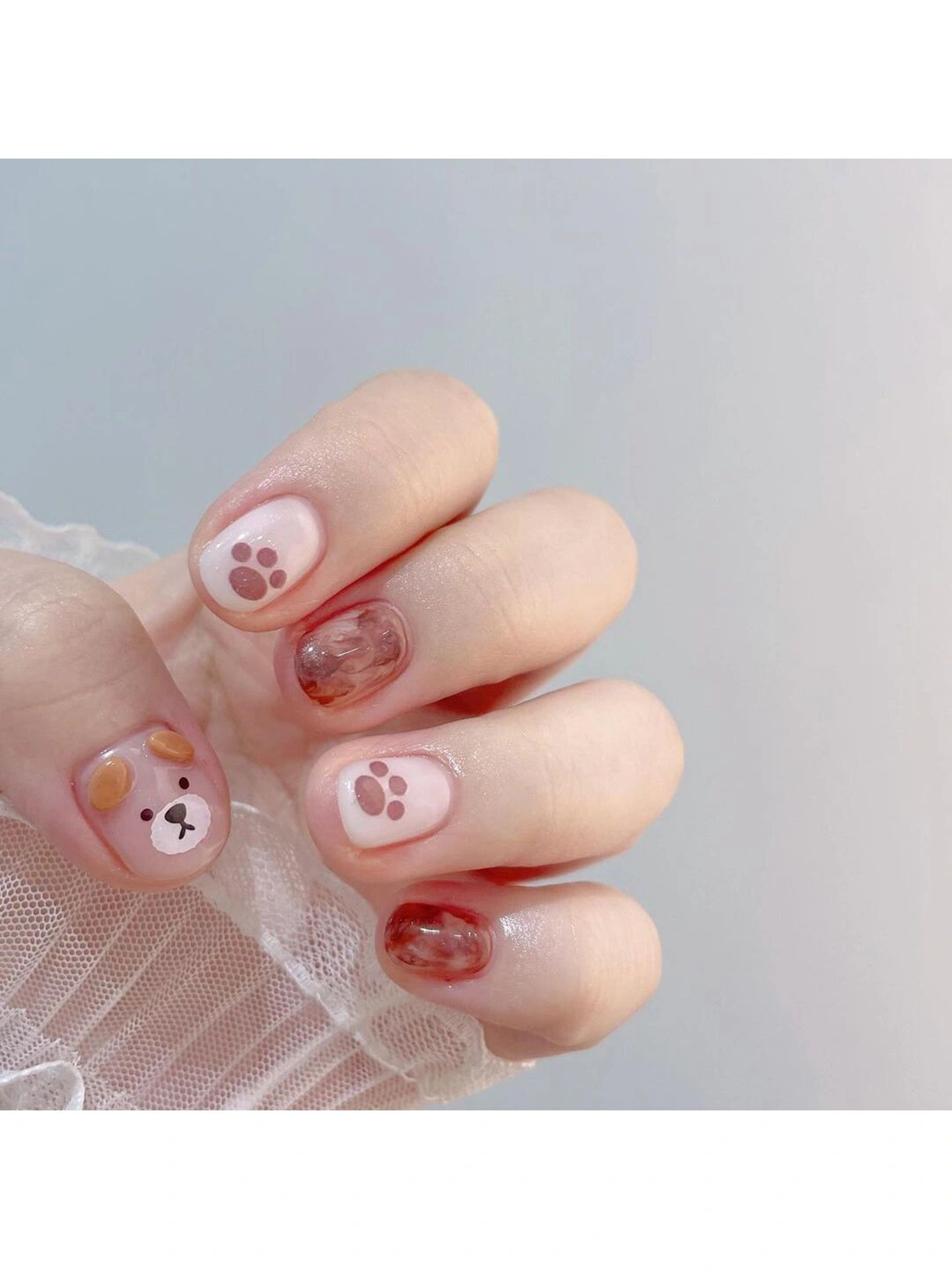 Nude and Pink Heart Short Round Nails shown as a nail art design with nude, pink, cute, japanese, heart, round and short details.