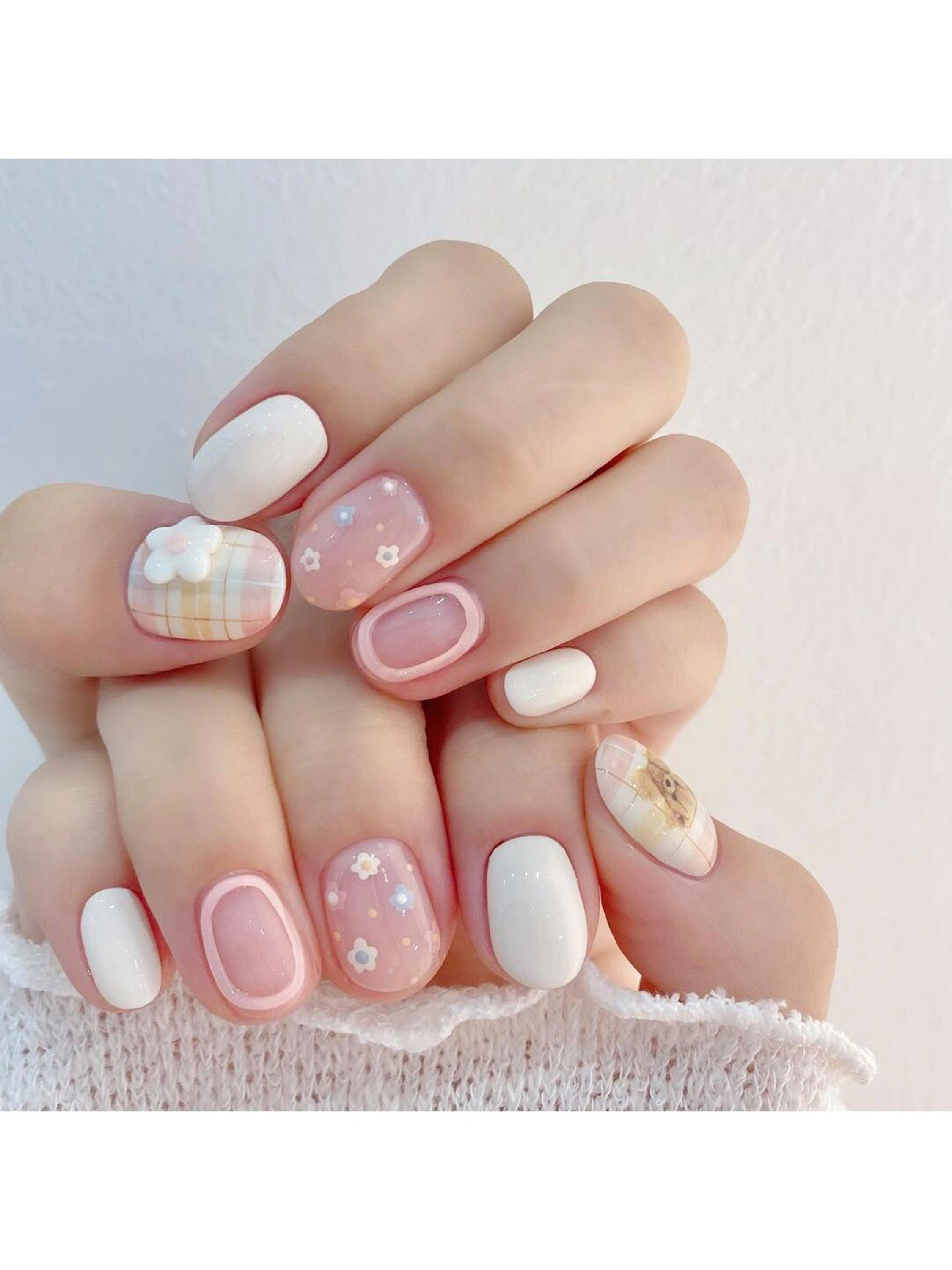 Pink, White and Pastel Floral Short Square Nails shown as a nail art design with pink, white, pastel, cute, floral, flower, square and short details.