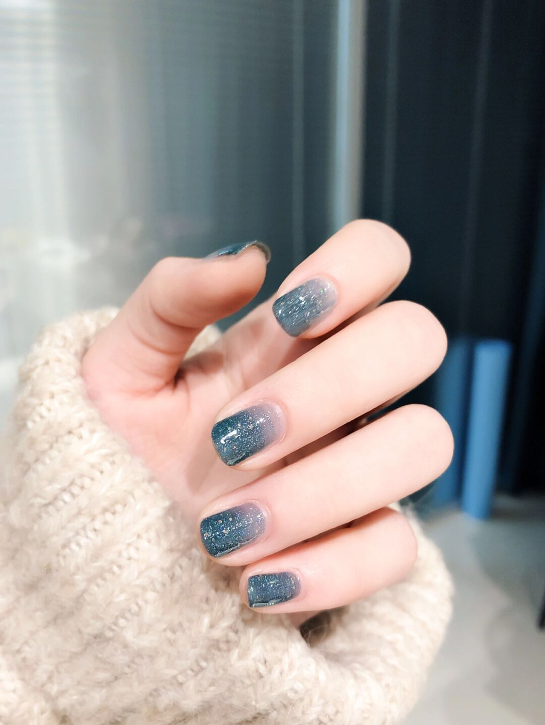 Blue Glitter Short Square Nails shown as a nail art design with blue, glitter, simple, square and short details.